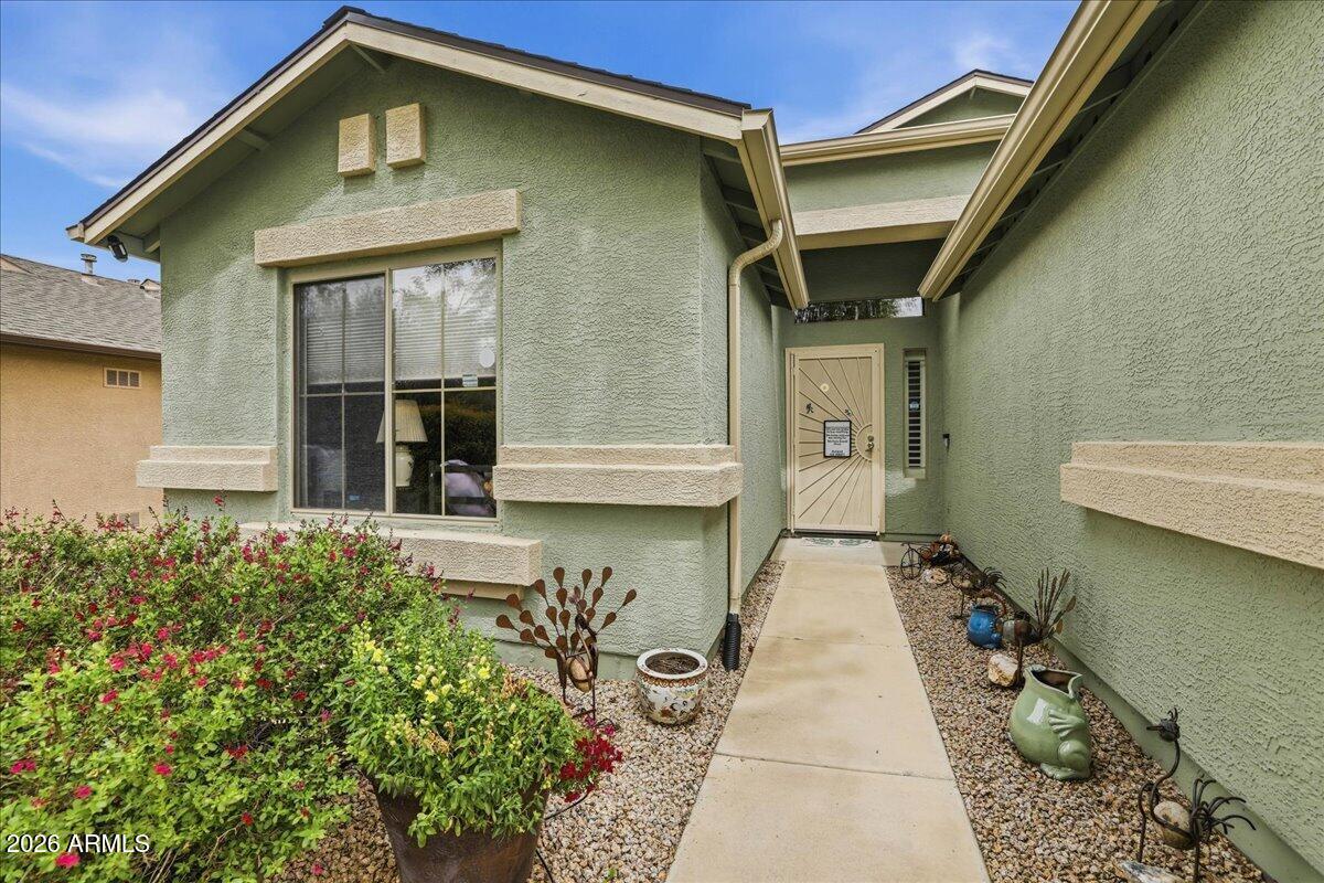 Spacious and move-in ready, this single-level home features 4 bedrooms and 3 bathrooms, offering plenty of room for comfortable living. Recent upgrades include a new roof, new flooring, new HVAC system, new gutters, and an additional paved parking space.

The second master suite offers a private entrance, walk-in tub, and its own hot water heater, Ac/Heating unit-ideal for multi-generational living or added guest privacy.

The property is beautifully landscaped with low-maintenance drip systems, synthetic grass in the backyard, and a large concrete patio, creating an inviting outdoor space. Interior upgrades include new blinds and shutters throughout the home.

Centrally located in Prescott Valley, this home provides convenient access to shopping, dining, and local amenities.