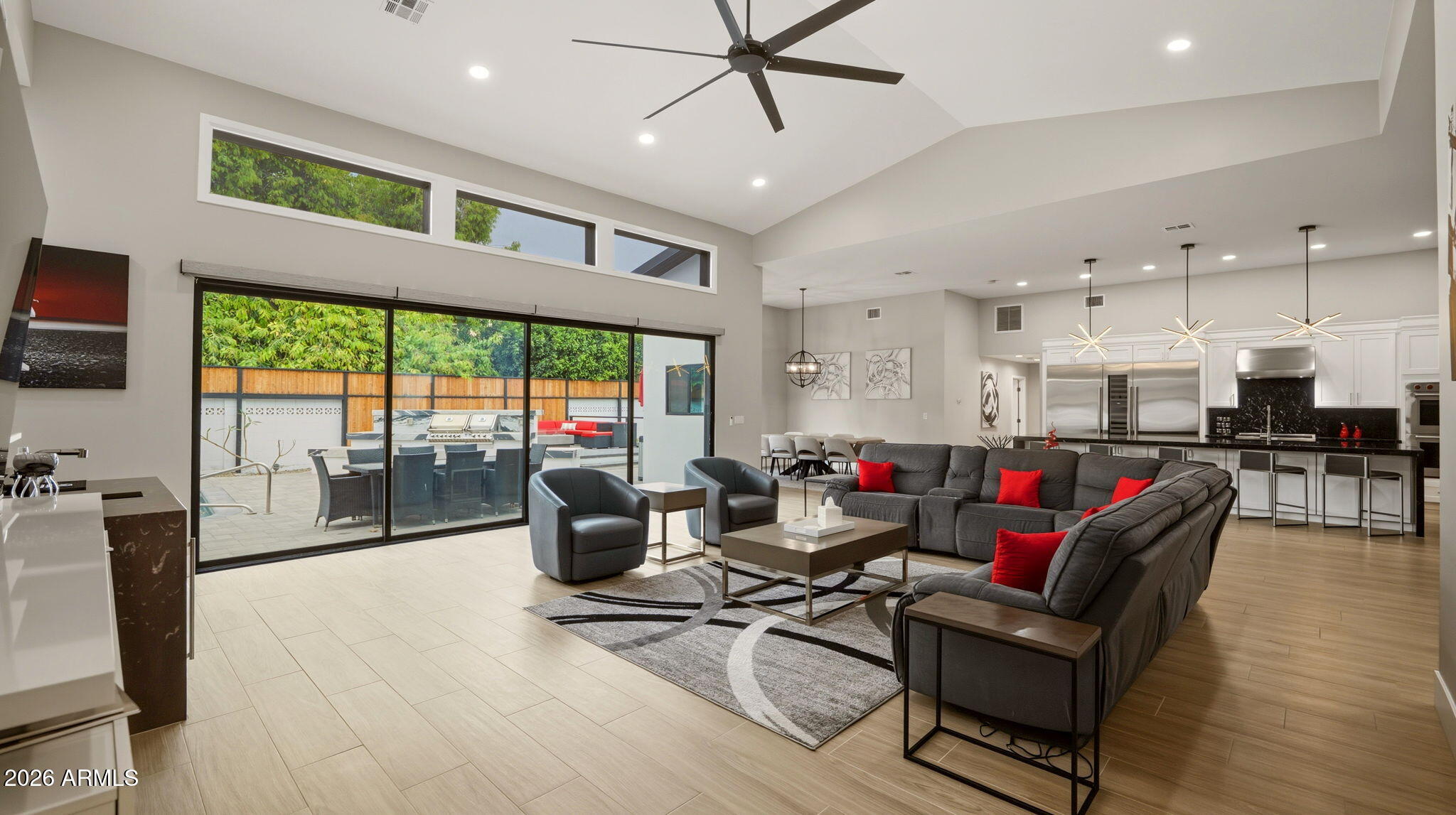 Welcome to this stunning renovation in Arcadia Proper. This 4,663 square foot home sits on nearly half an acre, offering a rare combination of timeless elegance, modern functionality, and luxurious indoor-outdoor living. Perfect for a family or an investor looking for a cash flowing rental just steps away from Old Town Scottsdale.

No detail was overlooked in the complete transformation of this 5-bedroom, 5.5-bathroom residence. From hand-selected tile flooring to top-of-the-line finishes throughout, every inch exudes quality and craftsmanship. The chef's kitchen is a showstopper, featuring Wolf and Sub-Zero appliances, custom cabinetry, and designer lighting -- perfect for entertaining or creating everyday culinary deligh The expansive great room flows seamlessly to the beautifully landscaped backyard, creating a true entertainer's paradise. With owned solar panels, this home offers energy efficiency without compromising on comfort or style. With the completely new plumbing and electrical, this home is move-in ready today.

What sets this property apart is the attached ADU (Accessory Dwelling Unit) guest house casita , that includes its own kitchen, living room, bedroom, bathroom with a jetted tub and steam shower. The private entrance makes it perfect for extended family, guests, or as a high-end income-producing rental.

Features:
4,663 sq ft | 5 Bed | 5.5 Bath
Nearly ½ Acre Lot in Prime Arcadia Proper
Complete Renovation with High-End Finishes
Wolf & Sub-Zero Appliances
Owned Solar Panels
Attached ADU Guest House with Full Kitchen & Living Room
Luxury Tile Flooring Throughout
Impeccable Indoor-Outdoor Flow
Don't miss your chance to own one of the most refined homes in Arcadia Proper   where luxury, location, and lifestyle converge.