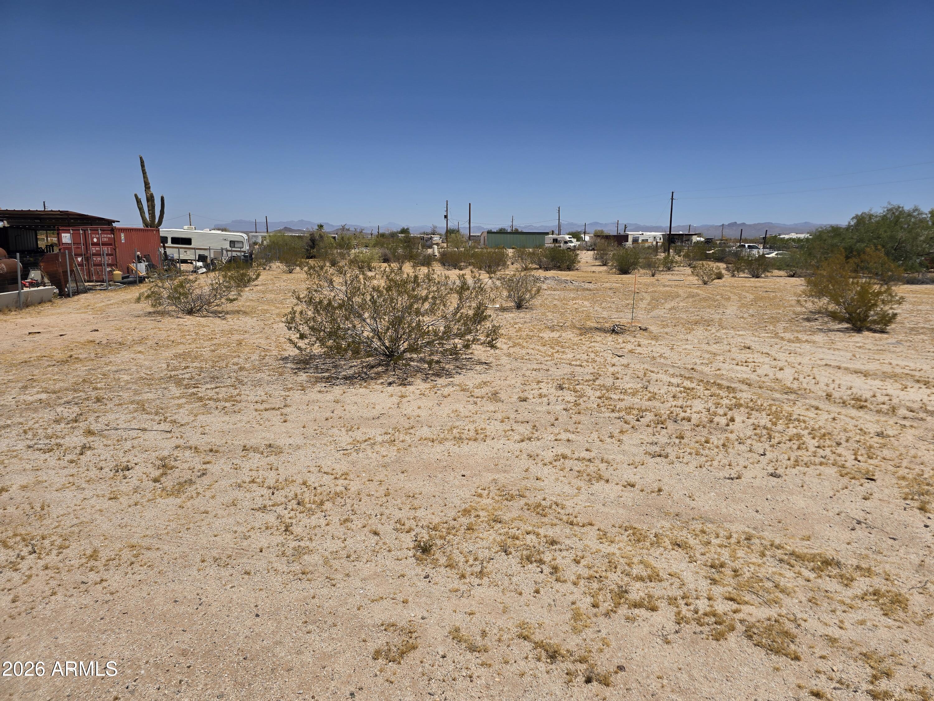 Discover the perfect blend of country living and future-ready convenience on this beautiful parcel in Florence, AZ! Major improvements are already in place, including permits pulled for septic installation and electric design, plus a shared well already installed. Save time and move closer to building your dream home, manufactured home, barndominium, or investment property. Enjoy stunning desert sunsets, mountain views, wide-open skies, and peaceful rural living with no HOA. Bring your RVs, ATVs, horses, and toys! See photos of the home plans for inspiration. Great opportunity to build now or invest in one of Florence's growing areas.