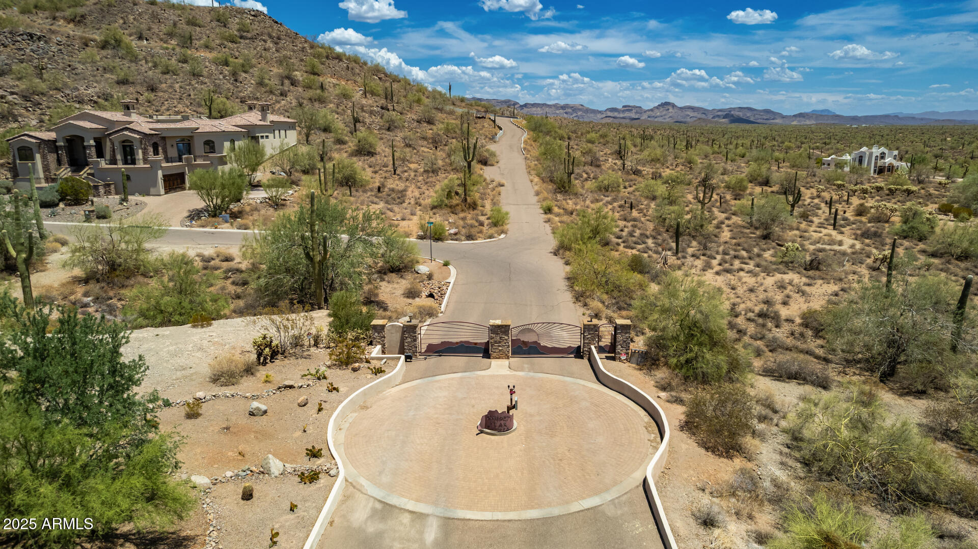 What a RARE find! Welcome to one of Gold Canyon's most elevated and breathtaking 5-acre parcels in a gated community. This extraordinary hilltop home-site offers unmatched panoramic views with surrounding mountain vistas, twinkling city lights, and gorgeous sunsets from every angle. Enjoy ultimate privacy, with the property bordering untouched state land and set at the end of a private asphalt road. Best views in Gold Canyon! All improvements are in place & ready for your custom build!  Whether you're dreaming of a luxury estate or a serene retreat, this property offers endless possibilities in a setting that truly goes above and beyond. Ask listing agent about the CAD renderings completed by the owner. View the video tours of the endless possibility's for the land development.
Just WOW!