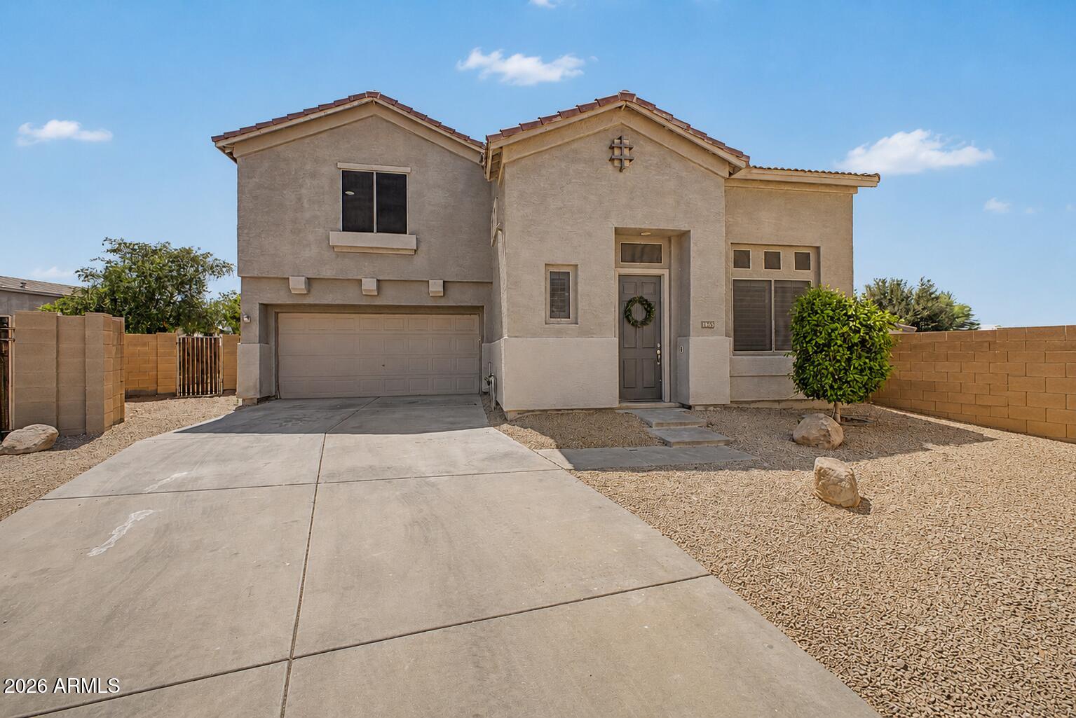 Fantastic opportunity to own this lovely 4-bedroom residence in Palm Valley! You're welcomed by a serene living room with high ceilings, a soothing palette, classic plantation shutters, and attractive wood-look flooring. Gather loved ones in the great room, complete with sliding door access to the backyard for seamless indoor-outdoor flow. The gourmet kitchen comes with quartz counters, white shaker cabinetry with crown moulding, a tile backsplash, and an island with a breakfast bar. The primary bedroom showcases an ensuite with dual sinks, and a walk-in closet. Unwind at the end of a long day in the backyard, which offers a covered patio and abundant space to create your own backyard oasis. Don't miss out on your chance to own this charming home!