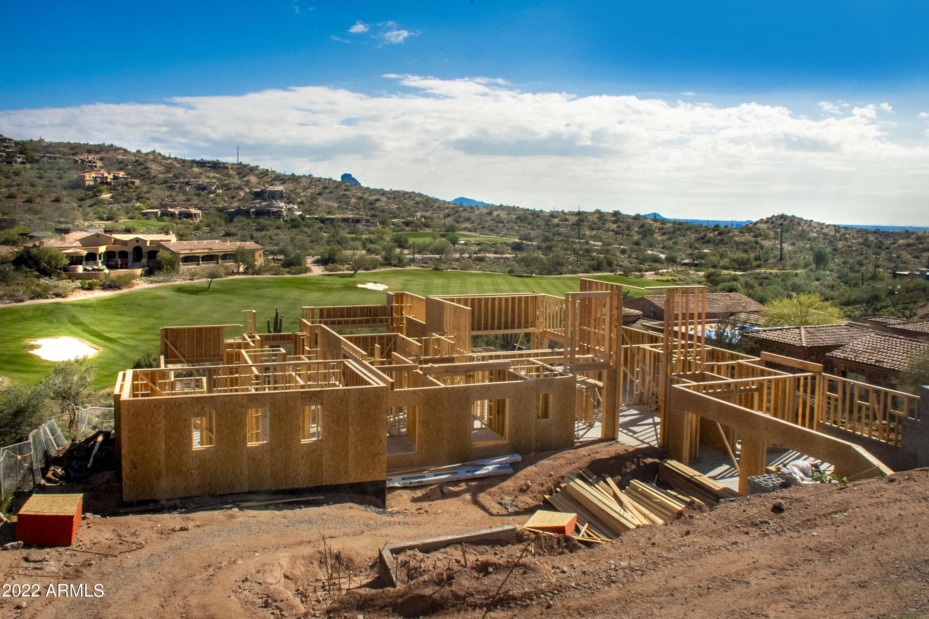 Spectacular casual contemporary spec under construction in Firerock Country Club.  5,400 SF, 4 BD (all en suite), 5 BA, office, game room, and 4 car-garage with hookups for electric cars and added height for lifts. Gourmet kitchen will offer double island, Wolf and SubZero appliances.  Upper level bedroom/suite/office and large game room with a bar, golf simulator/movie theater room. Incredible big city light and golf views from the upper deck.  Relax on the back patio or pool and watch the golfers hit their approach shots into Firerock's hole number 4 green.  Negative-edge fall away pool/spa. Home will offer all the desired amenities; chilled wine storage wall, steam shower, smart house wired, multi slide hideaway pocket door slider, 3 fireplaces plus patio firepit option, option/plans designed for elevator, whole house water filtration system, tankless water heater, and more. Convenient back gate access. Estimated completion September 2022.