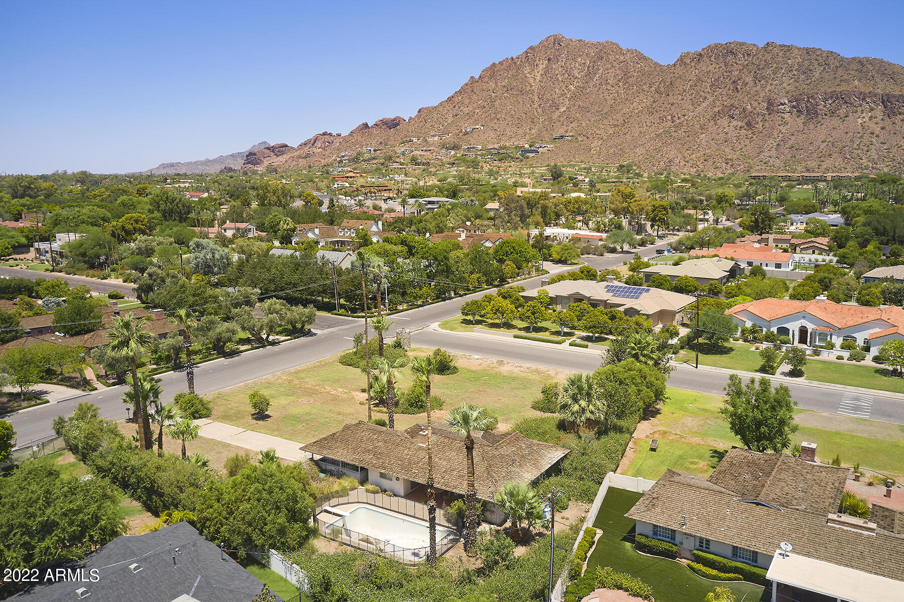 For the discriminating buyer that refuses to compromise for anything but the best. This spectacular corner lot close to 1 acre is situated on Exeter Blvd the most coveted street in prestigious Arcadia proper. Mesmerizing views of the iconic statuesque Camelback Mountain are awe inspiring. Create your dream home as the possibilities are endless on this phenomenal lot. Close proximity to the opulent Phoenician Resort, culinary restaurants in Scottsdale and Old Town, the bustling airport, vibrant downtown Phoenix and beautiful A.S.U campus. First time on market since 1976 making it a rarity for a lot of this esteemed caliber to even be available.  This is a once in a lifetime opportunity to own this crown jewel. Make your dreams a reality.