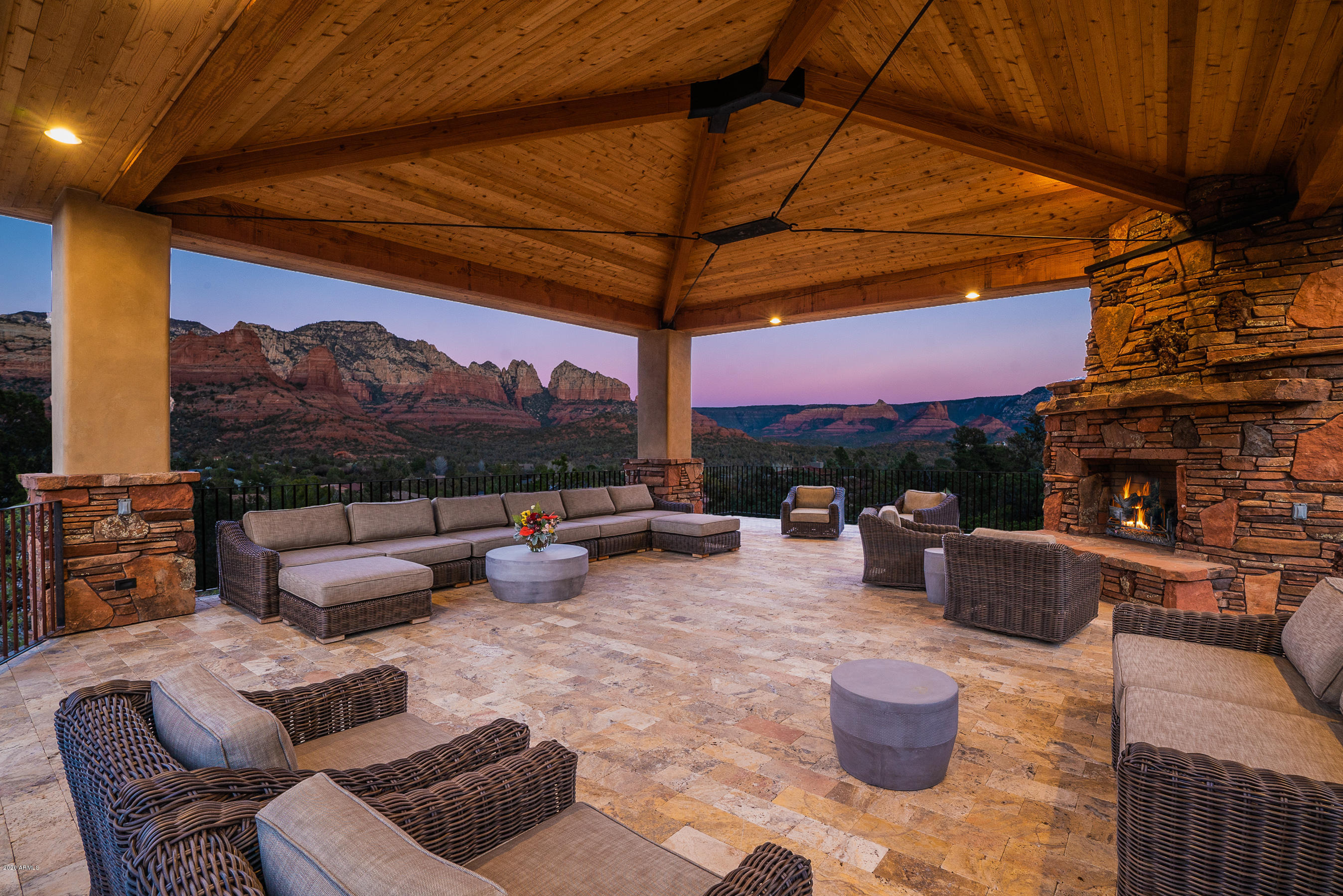 Extraordinary custom home built in 2018, located in one of West Sedona's most exclusive areas, ''Soldier's Pass''. This home exudes privacy, backs up against National Forest with Coffee Pot in your view corridor. The main residence features 4,838 SqFt with an elevator, three bedrooms, studio, library/study, two living rooms, gourmet kitchen, and laundry. The Guest Casita provides 492 SqFt with a king bedroom/bathroom suite and kitchenette area. Garage houses 4 cars + Tesla charging station. This property offers one of the most outstanding outdoor living spaces in Sedona including a cascading waterfall feature, outdoor kitchen & dining and a 2,400 SqFt Ramada. Home has an owned solar system providing ample power for lighting, appliances, and electric car charging station... MAIN LIVING LEVEL AT MAIN RESIDENCE: Open Floor Plan With With Incredible Red Views; Gourmet Kitchen; Great Room and Dining Area; Living Room; Library; Three Bedrooms Including Two Master Suites. Main Master Bedroom/Bathroom Offers Two  Fireplaces and Patio With Outdoor Fireplace Plus A Bonus Studio Room Off Master or Meditation Room. Gorgeous Coffee Pot National Forest Viewing Deck Off The Great Room. Second View Deck off the Living Room/Piano Room. Your Own Library With Custom Bookshelves Off The Great Room & Patio & Dog Run Off Study. Library Showcases A Built In Book-Case That Opens Into A Hidden Stairwell From Study Onto The Lower Level. Laundry Room With Ample Custom Cabinetry For Storage & Under-Mount Sink. Solar Power Provides Power To Main Living Level. 

* LOWER LEVEL AT MAIN RESIDENCE: Media Room/Den/Office or Large Recreation Room/Or In-Law Quarters Includes 3/4 Bathroom with Shower. Elevator Room With Additional Custom Storage Space. Two-Car Garage With Storage. Solar Operates Tesla Charging Station In Garage.

* CASITA WITH ADDITIONAL TWO CAR GARAGE ATTACHED: King Size Bedroom With Kitchenette, Including Refrigerator & Microwave Oven. Bathroom With Walk-In Shower.

* 7 Fireplaces Included (4 Indoor Gas; 2 Outdoor Gas; 1 Outdoor Wood Burning Off Master Patio)

* Waterfall Feature & Covered Ramada: 2,500 SqFt Deck 

* Two (2) Hidden Safe Rooms

* One Large Safe Included In Purchase & One Wall-Mounted TV Conveys

* Furniture Available To Purchase With Close Of Escrow - Outside Sale Of Home With A Bill Of Sale

* Appliances Included: 2 Refrigerators, 2 Microwaves, Dishwasher, Washer, Dryer, Gas Range & Oven, Water Softener

* Fencing For Dogs In Back Yard (Dog Run) Off Study

* Landscaping On Automatic Timers and Drip System

* Fire Sprinklers, Carbon Monoxide Smoke Detectors

* 4 New AC Units (3 In Main House & 1 Split Unit In Casita) - 4 Zones

* New Gas Heating Lennox Furnaces + Split Unit In Casita

* Walk-In Closet With Custom Shelving In Master Bedroom; Soaking Tub and Steam Shower In Master Bath

* Hardwood and Travertine Stone Flooring

* Santa Fe/Southwest Style With Gorgeous Architectural Features

* Block Construction 

* Utilities: 220 Amp; Electric, Cable, Internet; City Sewer; Natural Gas; Solar; Electric; Charging Station For Tesla

* Property Borders National Forest

* Domestic Animals Only In This Subdivision

* HOA Dues: $720.00 Per Year - No Short-Term Vacation Rentals Are Allowed

* Taxes (2019): $11,310 Per Year