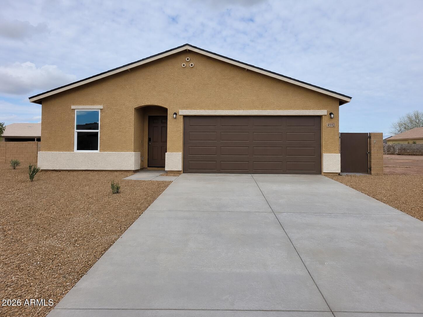 Welcome to 8592 W Oneida Dr in Arizona City, where comfort, style, and value come together. This beautifully maintained home offers an inviting open layout filled with natural light, spacious living areas, and a functional design perfect for everyday living and entertaining. The well appointed kitchen flows seamlessly into the main living space, while generously sized bedrooms provide comfort and privacy. Step outside to enjoy a large backyard with endless possibilities for relaxation, gatherings, or future enhancements. Conveniently located near golf, parks, shopping, and easy access to I10, this move in ready gem delivers the Arizona lifestyle you have been looking for. Do not miss this exceptional opportunity.