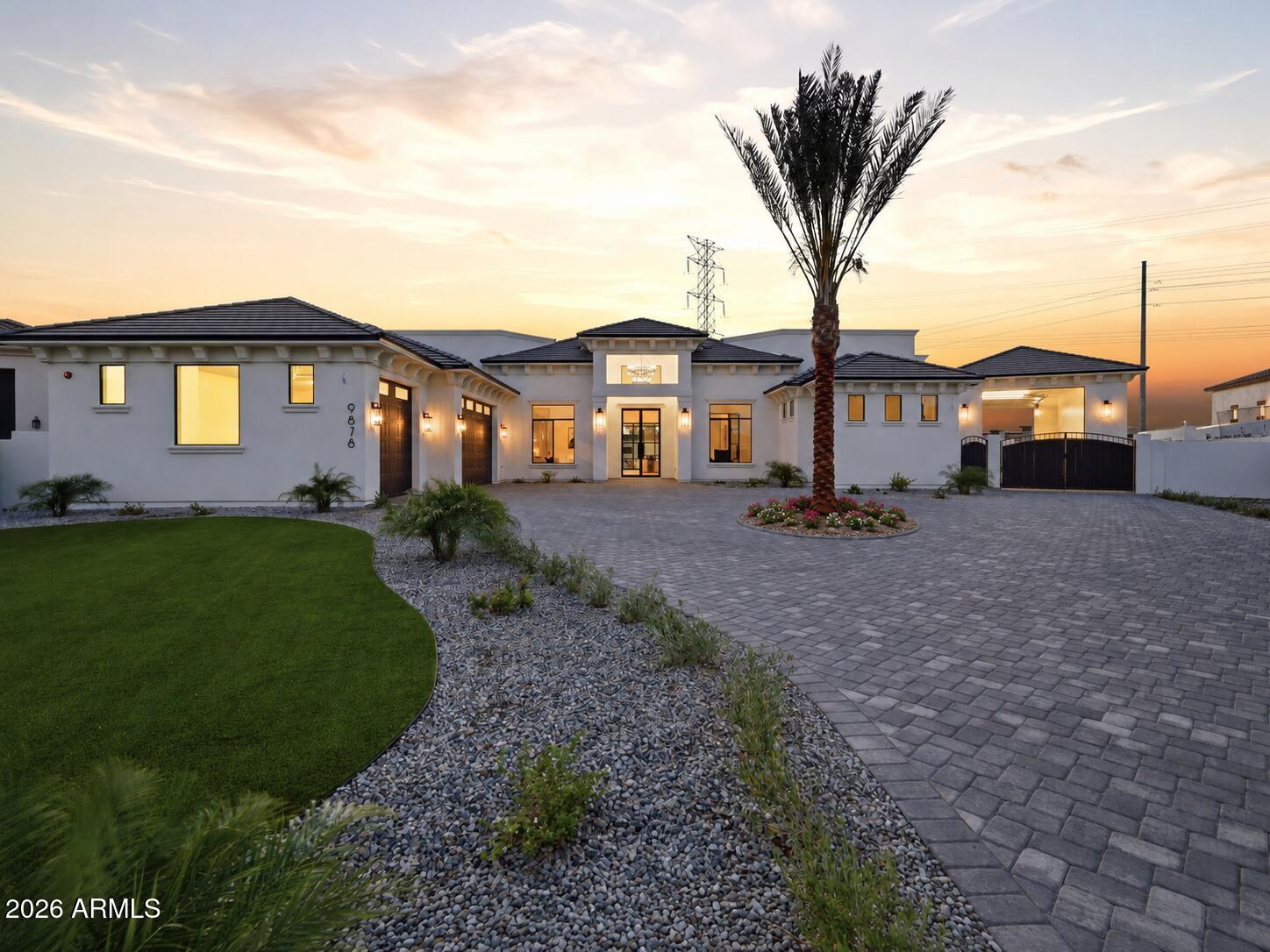 Welcome to the pinnacle of luxury living at Melton Ranch, a prestigious gated community tucked into North Peoria. Enjoy a lifestyle surrounded by mountain views, hiking and biking trails, and quick access to Lake Pleasant for boating and water sports, all while being minutes from Four Corners, top restaurants, shopping, and freeway access. This stunning estate features European white oak floors, marble finishes, Taj countertops throughout, and en suite bedrooms in every room, and a hidden pantry! Designed for elevated living and entertaining with a resort style pool, spa, marble patio and pool deck, plus a private acrylic pickleball court. Oversized RV garage and expansive garage space, while still having ample yard space. If you care about luxury details, you have to see this home!