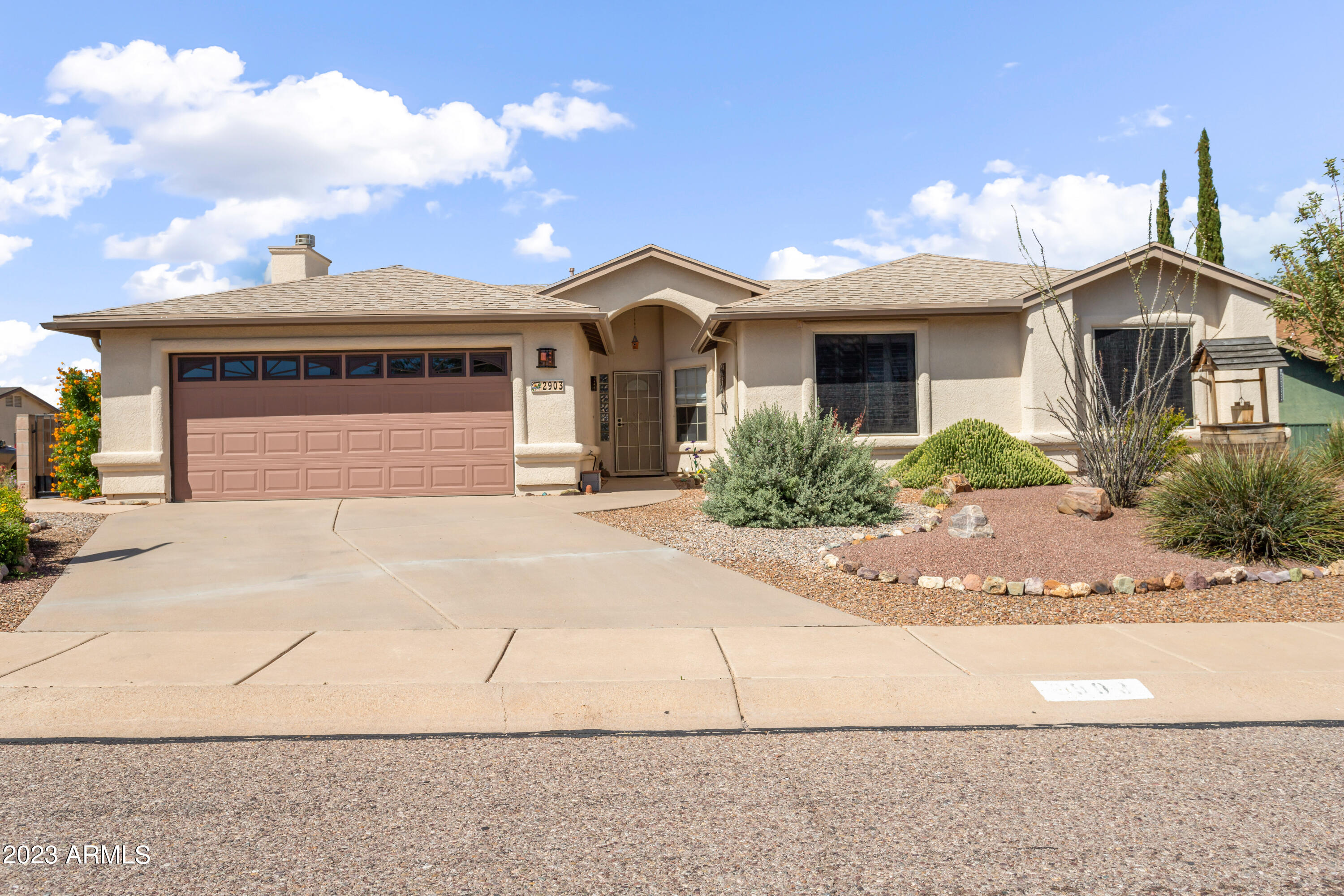 Energy efficient home with brand new GE stainless steel kitchen appliances, newly installed solar system and new roof with a 30-year warranty. Beautifully landscaped front and back yards with multiple fruit trees and hedges which provide backyard privacy. Large corner lot with gorgeous views of the Huachuca Mountains. Interior contains updated Corian countertops, designer lighting and window treatments, ceiling fans and flooring that is less than 7 years old. Home has 2 fireplaces, a rare find! Living room has beautiful custom built maple wood shelving unit. This home is a golfer's paradise, situated less than 1 mile to PDS Golf and Country Club and less than 5 miles to the Mountain Vista public golf course. Close proximity to schools, hiking/biking trails and camping opportunities makes this home a must see. Sellers will consider conveying certain furniture items with an acceptable offer. Low interest (1.49%) solar loan balance will need to be assumed by buyer. Inquiries about loan specifics and electric bill benefits are encouraged. Don't miss out on owning this fabulous home.