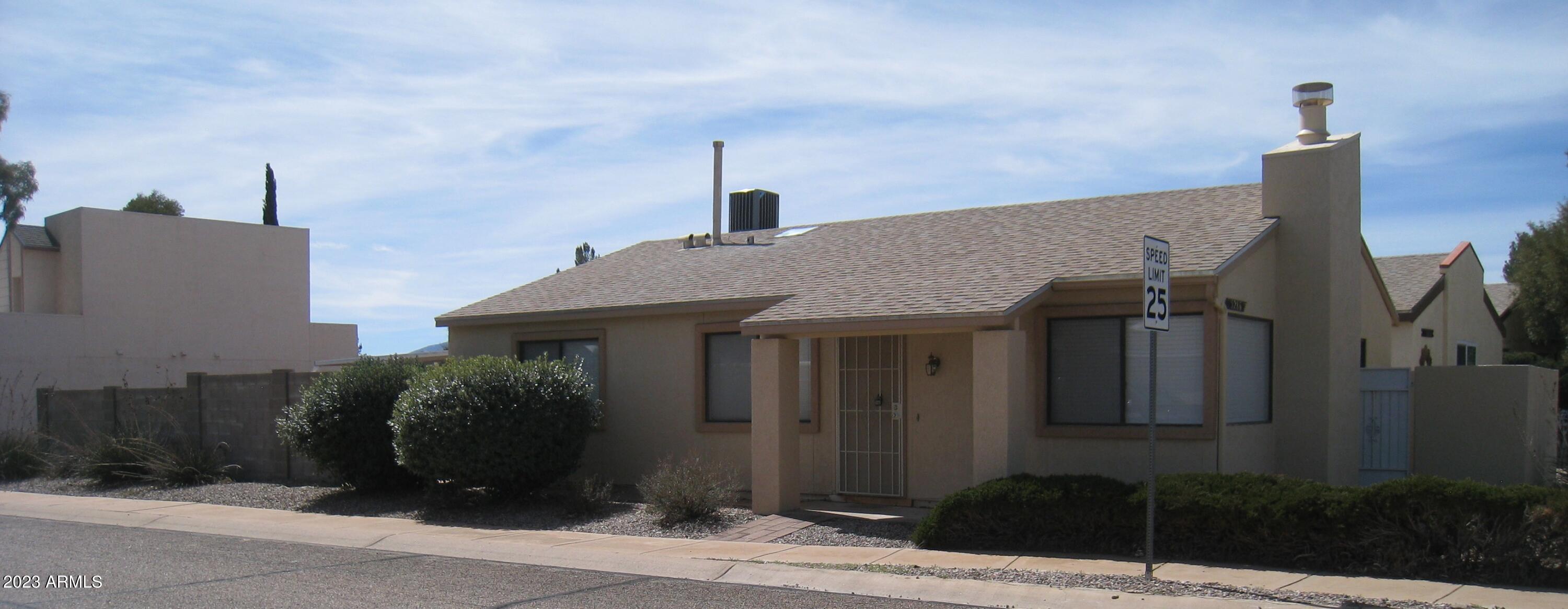 Located on a private corner lot, this home features a great backyard patio space for entertaining and zero landscaping maintenance. Features tile throughout and a gas fireplace to enjoy on those cool winter nights. The entire backyard and carport have been enclosed within a block wall, which is very rare for this community - great for privacy. Take a dip in the community pool and spa and enjoy Arizona living.