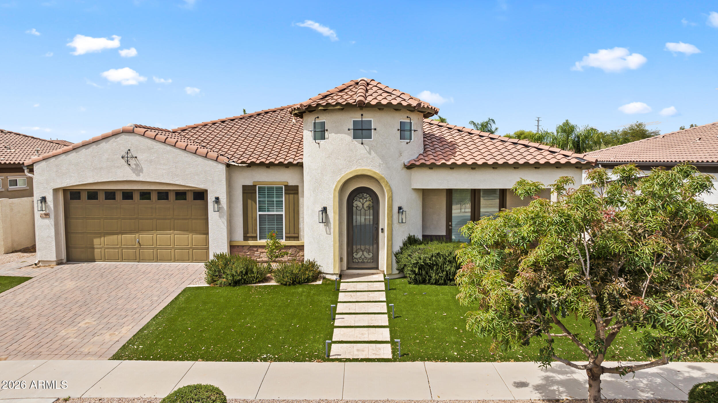 Welcome to  a refined single-level residence offering 3,013 sq ft of thoughtfully designed living space, blending modern comfort, flexibility, and understated luxury in one of Queen Creek's most desirable areas.

This elegant home features a highly functional layout with 4 bedrooms + private den + expansive loft-style flex space, offering exceptional versatility. The den is ideal for a home office or guest suite, while the loft provides additional flexible living space that can serve as a media room, lounge, creative area, or future bedroom conversion.

The open-concept main living area creates a seamless flow between kitchen, dining, and living spaces, enhanced by abundant natural light and a design that supports both entertaining and everyday living. The primary suite is a private retreat, featuring a spa-inspired bathroom with dual vanities, a spacious walk-in shower, and a dedicated space designed for a future custom soaking tub installation. The walk-in closet offers upgraded storage potential, allowing for custom organization and a boutique-style dressing experience.

Secondary bedrooms are well-sized and thoughtfully positioned for privacy and flexibility, accommodating family, guests, or multi-use needs.

Outdoors, enjoy a low-maintenance backyard designed for relaxation and entertainment, highlighted by a unique mini golf feature that adds lifestyle value and a fun, distinctive touch to the property.

Located near schools, shopping, dining, and major commuter routes, this home delivers both convenience and long-term livability in a strong Queen Creek location.