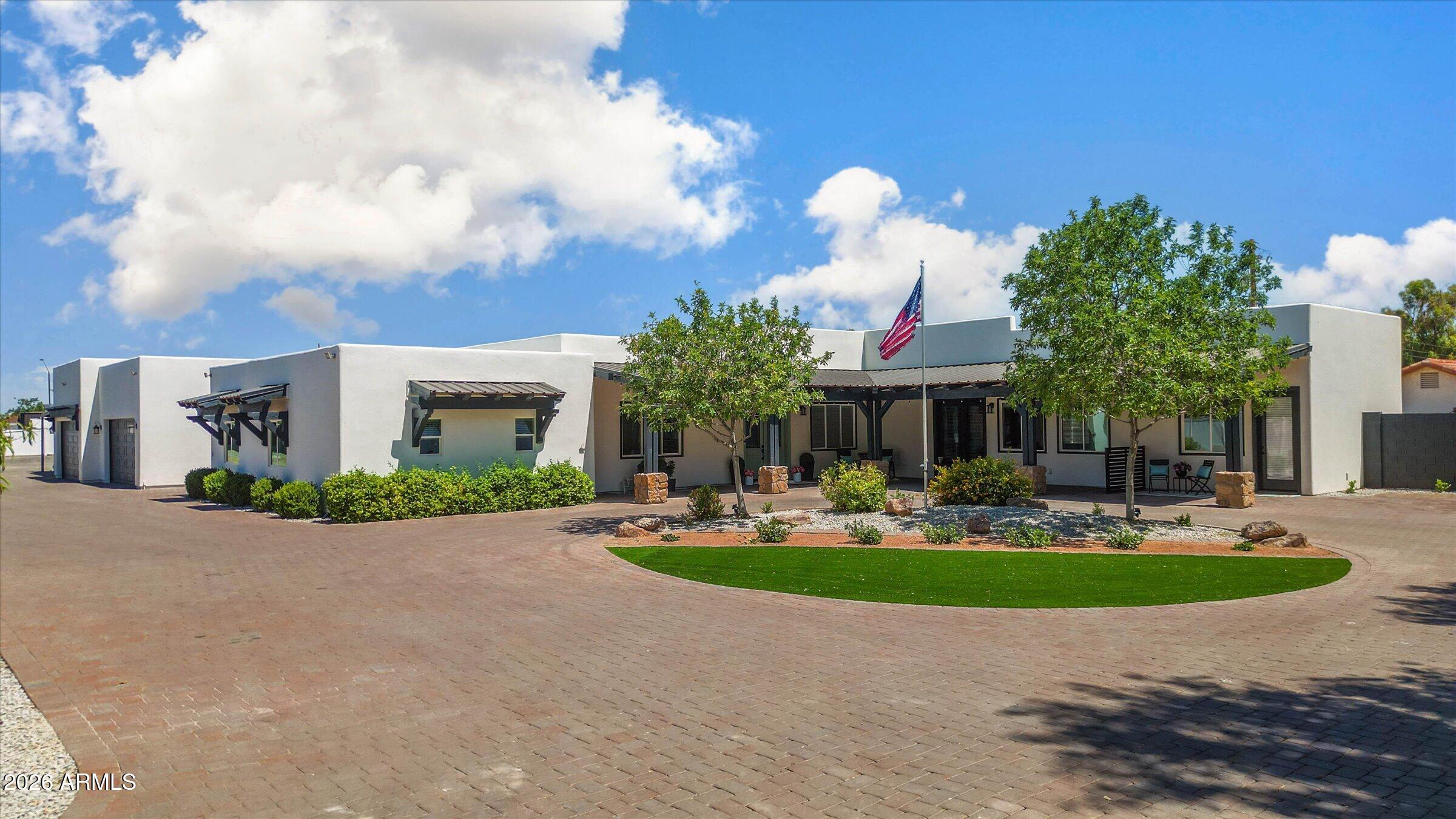 Experience cozy country living w/NO HOA! 1 mile from San Tan Village's upscale shopping, fine dining, & premier amenities! This recently remodeled 5650 sqft estate w/ guest house shows like a new home. Privately situated at the end of a paved easement in one of Gilbert's most desirable areas, this rarely-available location is ideal for family safety. It's secluded setting enhances the property's peaceful & exclusive atmosphere. This 8-bed, 9.5 bath multi-generational estate offers ensuite bedrooms providing exceptional privacy & flexibility for extended family & guests w/ample separation of space while maintaining a sense of connection throughout the property. Step outside to expansive covered patios ideal for entertaining & relaxing. Includes a chicken coop & huge garden area ready to go!