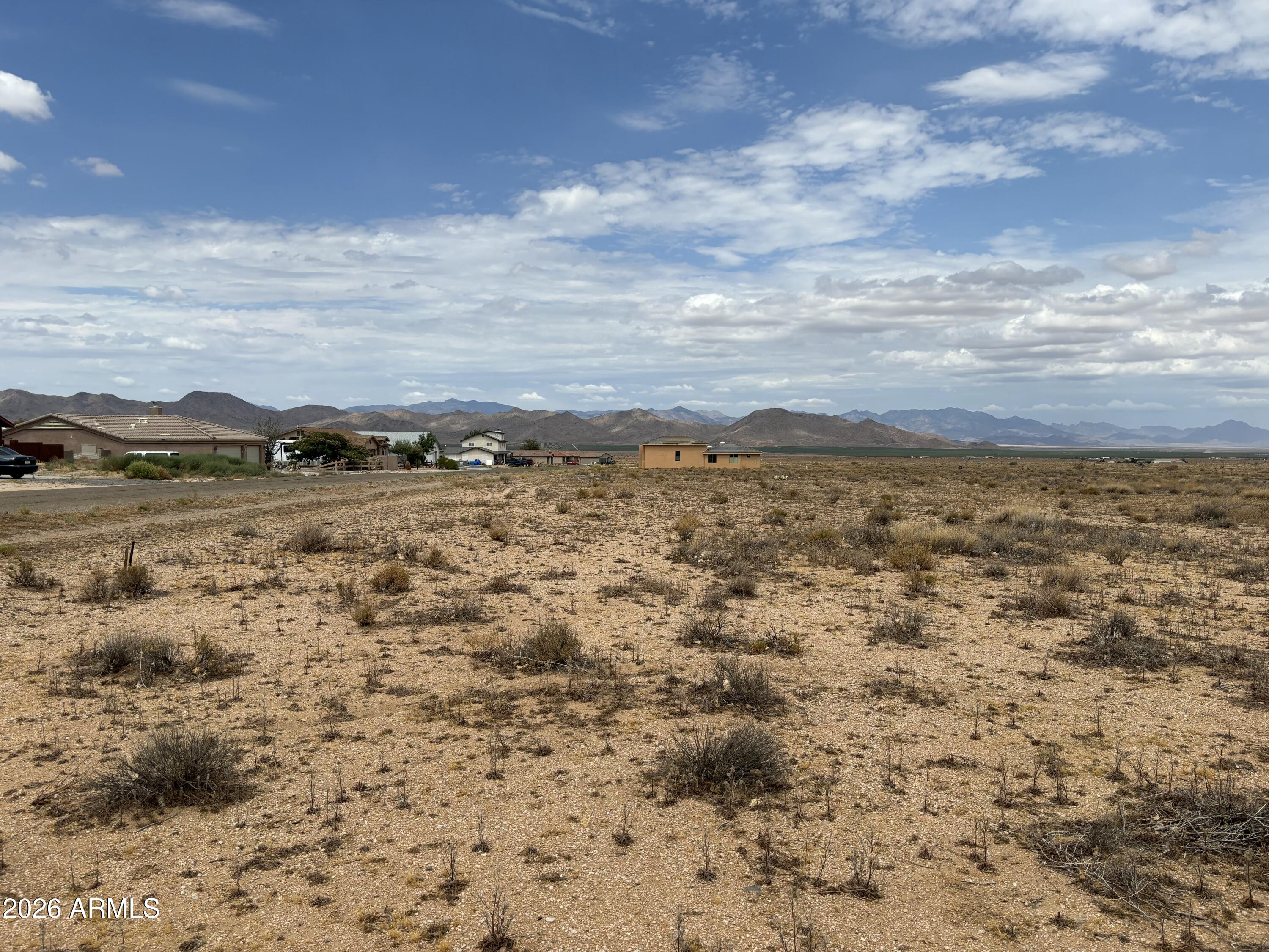 Seller Says SELL - Bring Your Offer! Don't miss this outstanding opportunity to own land in the fast-growing Valle Vista community just minutes from Kingman! Build your dream home or invest in one of Mohave County's most exciting growth areas. Wake up to breathtaking mountain and desert views, enjoy Arizona's wide-open skies, and take advantage of the incredible lifestyle Valle Vista has to offer. Tee off on the beautiful 18-hole championship golf course, then enjoy the clubhouse, restaurant, park, pool, library, and more. Maintained roads provide easy access, with Historic Route 66 and Kingman just a short drive away. Utilities are available in much of the community (buyer to verify availability and connection costs). Whether you're building today or buying for tomorrow, act Today!