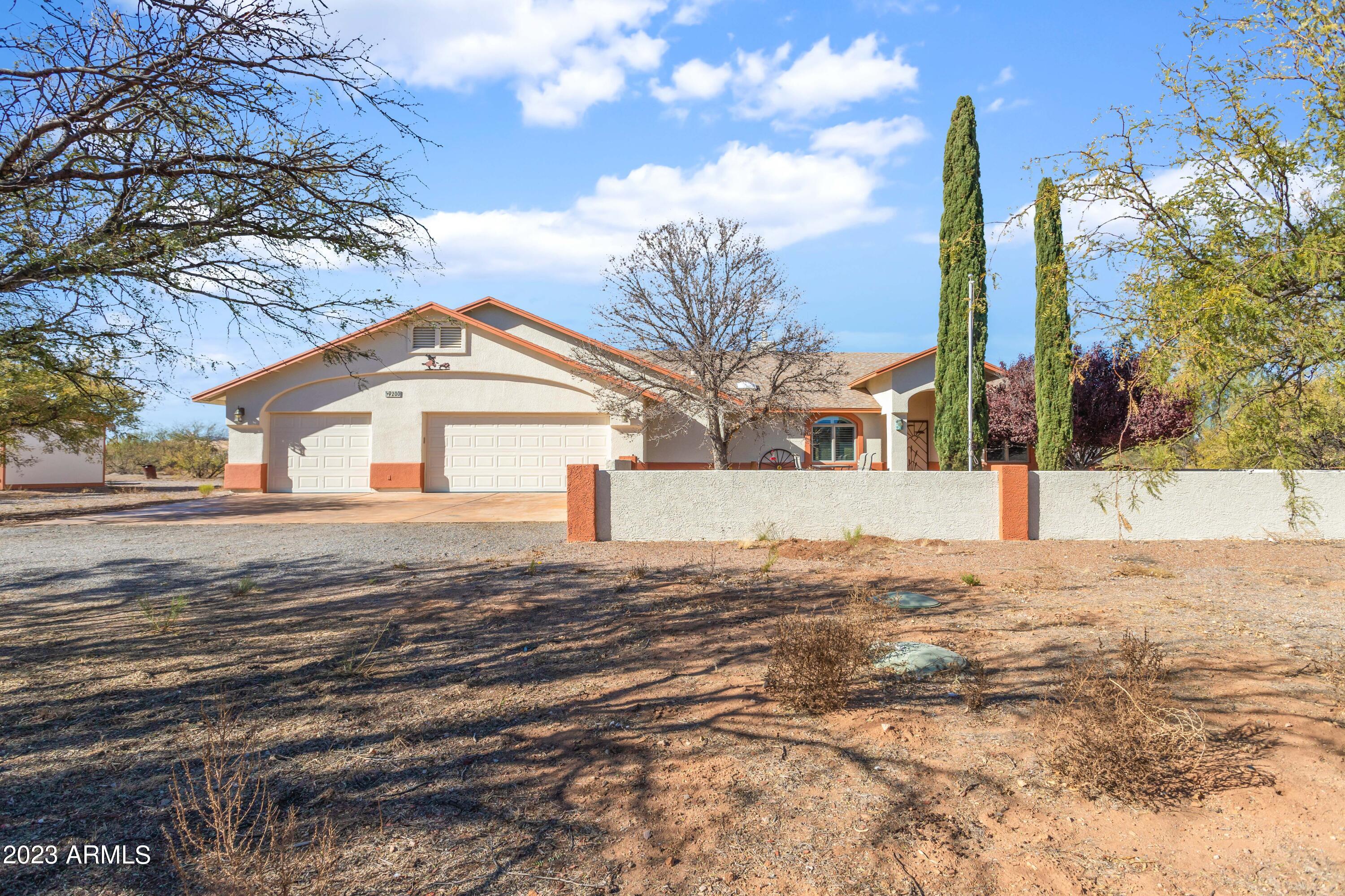 Will maintained home, No H.O.A. On 4 acres ,Owned solar system  Tile roof, A/C cooling, fireplace large great room, split floor plan, spacious kitchen with Beverage area with wine cooler pull out cabinets ,Heated and cooled 1500 sq. ft. enclosed AZ. room , Private  court yard in front,  Back yard has 2 storage buildings. Enjoy beautiful Mountain Views. Mounted T.V's convey .