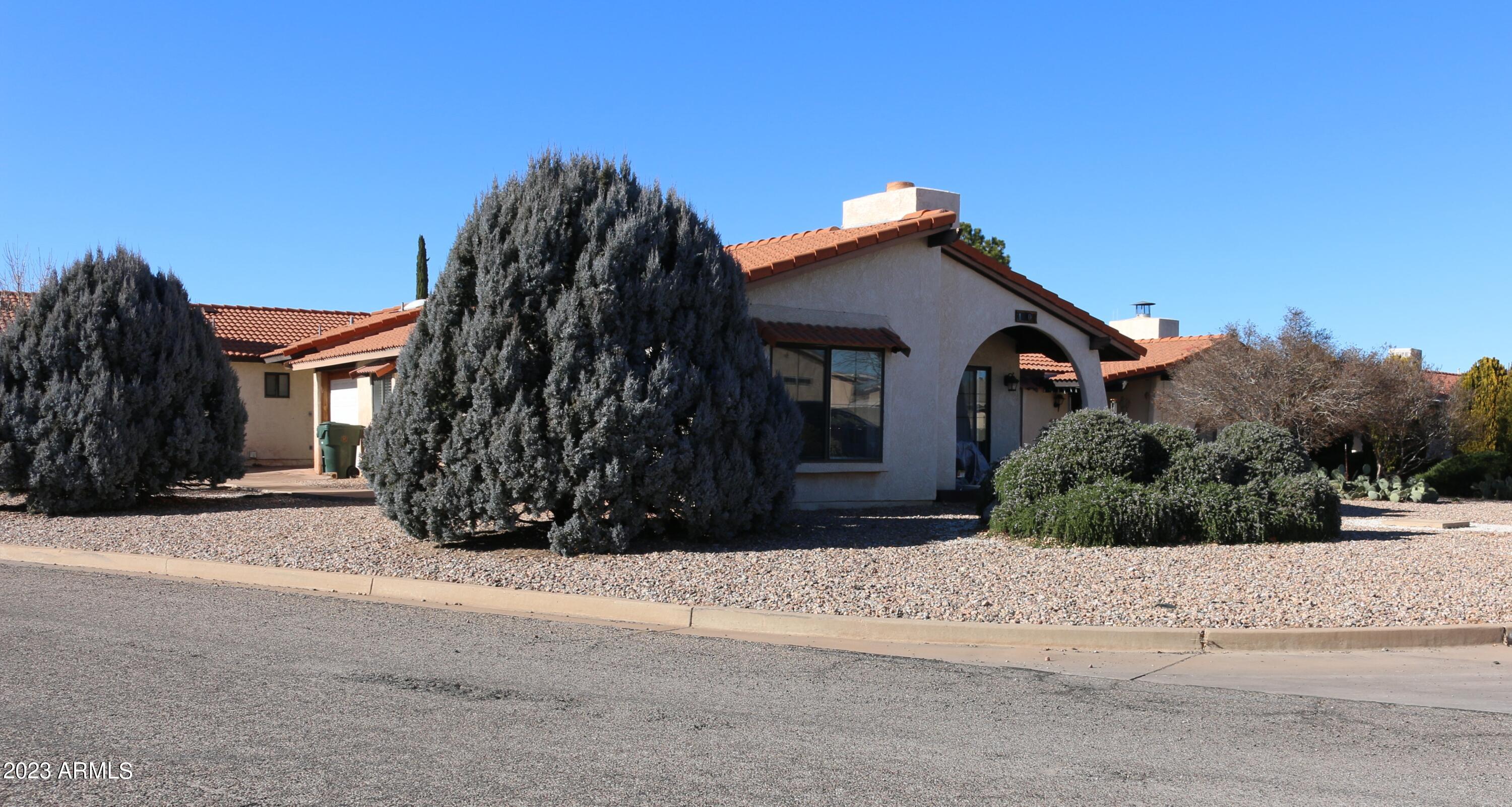 Cute condo with 2 Bedrooms & 2 Baths.  Corner Lot location.  Cozy wood burning fireplace.  1 car garage has additional parking & storage unit.  Great location near Cochise Racquet Club, Restaurants and Sierra Vista Mall.