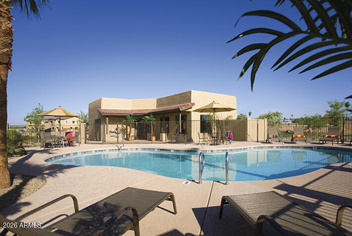 Welcome to a beautifully maintained furnished 3 bedroom 2 bath townhome in the gated community Villa Rialto that's ready for a nearly effortless move-in. This home features a warm and inviting color palette with granite counter tops, maple cabinets, and pretty furnishings throughout. NEW PLUSH SHAW CARPET AND PAINT IN LIVING SPACES. The property is just steps away from the sparkling pool and clubhouse. This community also offers a dog park for your furries and a workout room for you. It's just a few minutes drive to the Superstition Shopping Mall and located within 5 miles of 8 golf courses.