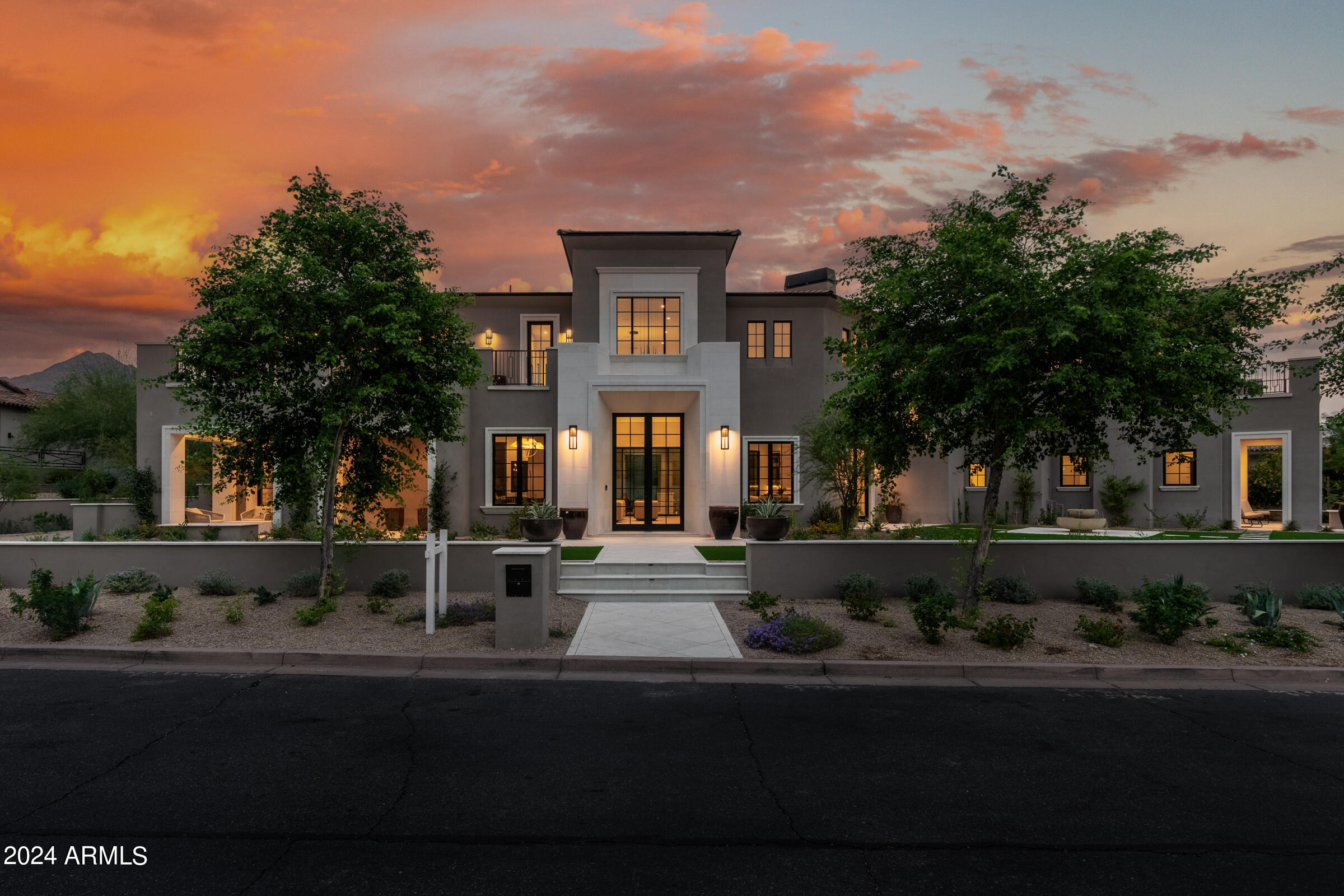 BEST VALUE in all of Silverleaf! This stunning Patterson Homes build is the only new construction priced under $1,000 per square foot in any of the Silverleaf communities. Ideally positioned in the exclusive 24hr guard gated community, Arcadia at Silverleaf. Breathtaking backyard views of the McDowell Mountains and beautiful front yard views overlooking one of Arcadia's distinctive parks. Spanning 7,741 sq ft, this residence blends elegance and tradition with a soft modern touch. Designed for discerning buyers, the first level features a luxurious primary suite, a private office, and a gourmet kitchen with SubZero/Wolf appliances. The grand living area boasts 24-foot ceilings and a unique three-sided cantilever fireplace. The flexible floor plan provides spacious 2nd-story space for guests or family, with 4 additional en suite bedrooms, a loft, and a flex space. Each room offers seamless indoor-outdoor living with access to outdoor patios.

Experience an unmatched luxurious lifestyle in this Arcadia at Silverleaf masterpiece. More than just a home, it's a statement& a rare opportunity for those who demand the very best. Don't miss your chance to own this extraordinary estate.
