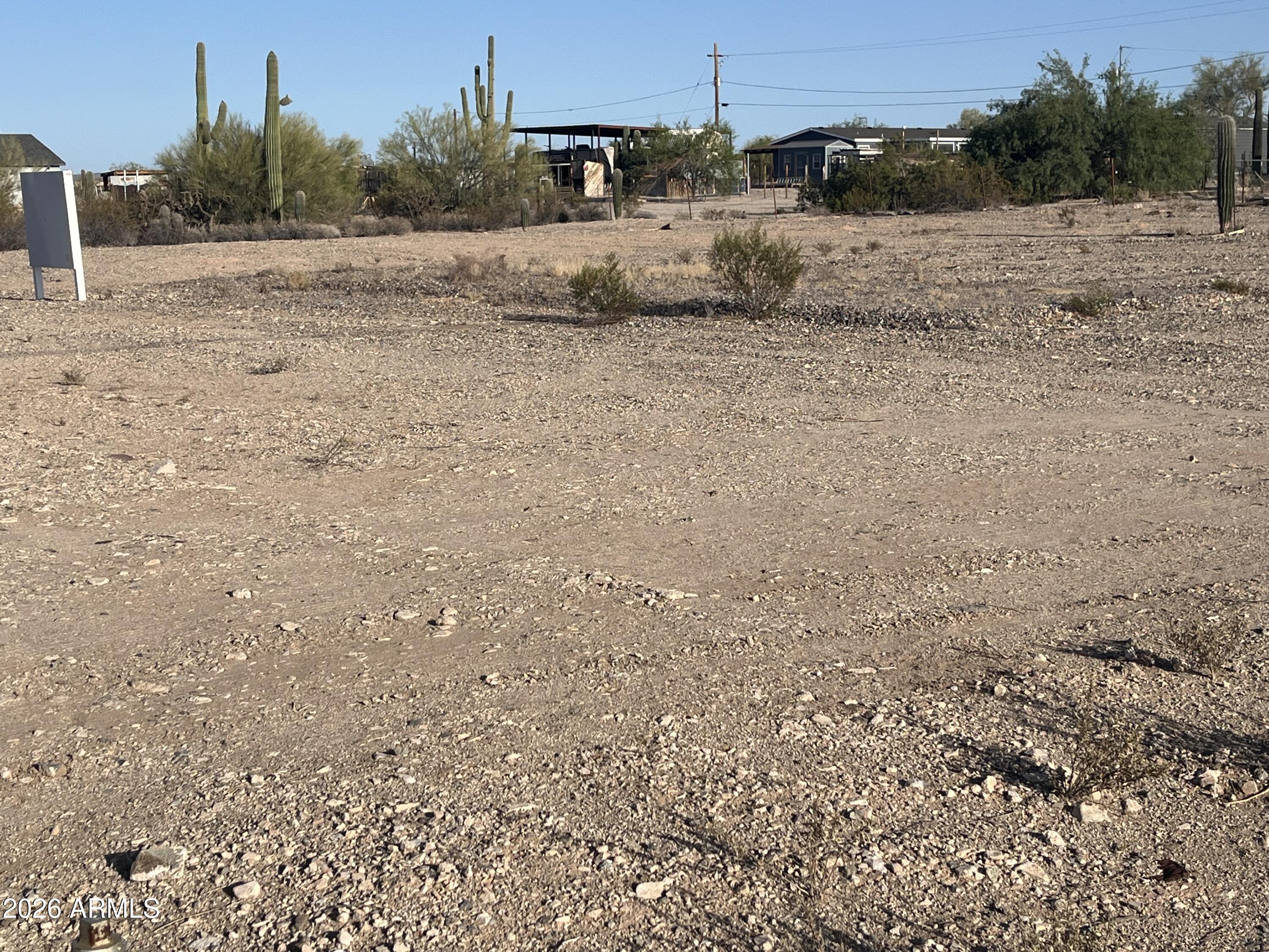 Discover a versatile parcel offering a great opportunity to build in a quiet desert setting. This property features water and electric available on the property, providing convenient access for future development. The land is flat with a gentle slope, making it suitable for a variety of site plans. Enjoy wide-open views, natural desert landscape, and the flexibility to create your ideal setup.

Buyer to verify all utilities, zoning, and use requirements.