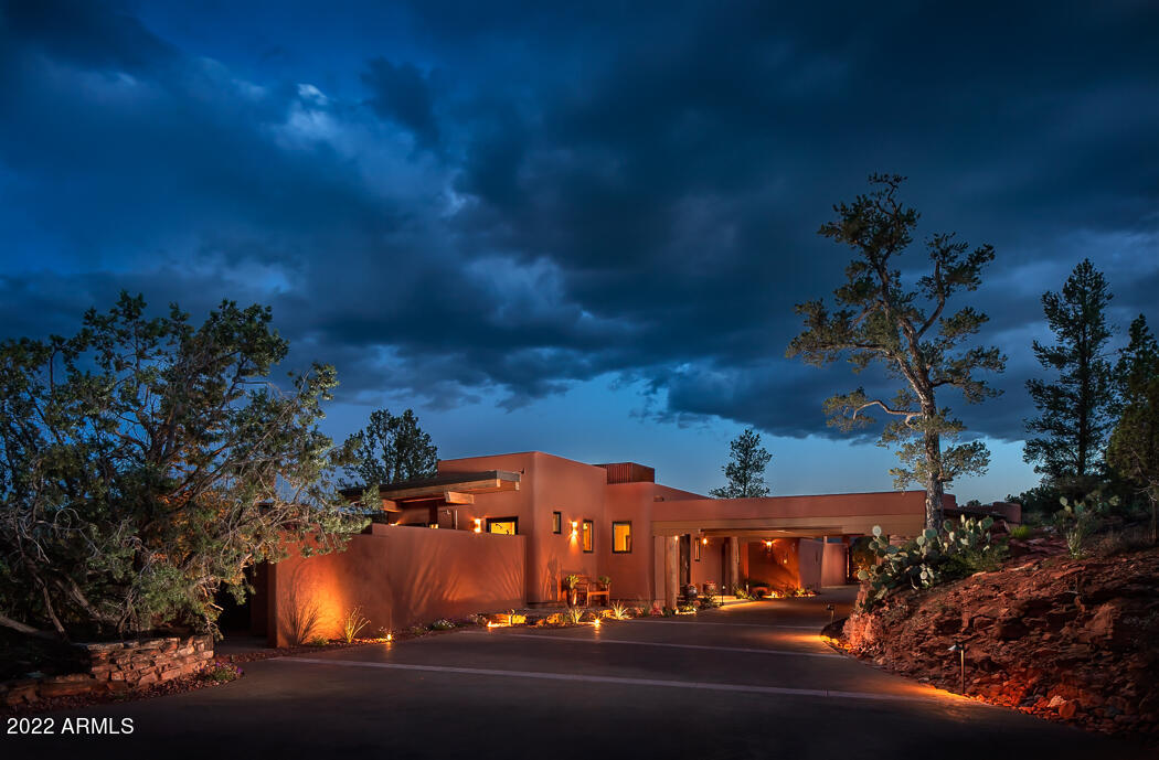 Sedona's Historic Red Rock Ranch - a 35 acre spectacular legacy property is your once-in-a-lifetime opportunity to own a piece of history.  Just outside city limits, this no HOA property offers the best views in Sedona, 1000+ ft of Oak Creek ownership and rare historic ditch rights. The ranch offers two homes, both fenced and gated, offering ultimate privacy. The spacious 5400 sq ft main home has two living spaces, walkout basement and mature landscaping. A stunning 900 sq ft guest casita, with two view patios, overlooks Oak Creek. Both homes offer 180 degree jaw dropping views with Cathedral Rock center stage. 
A perfect location to create your legacy - family compound, horse property, mini farm, the possibilities are endless. Come live your Sedona Dream!