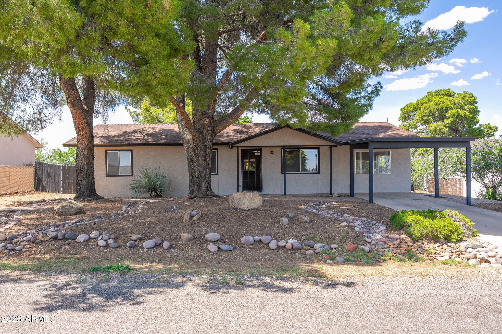 Welcome to this beautifully refreshed 4-bedroom, 2-bathroom home in the heart of Cottonwood! Offering 1,612 square feet of comfortable living space on a spacious 0.20-acre lot, this property combines functionality, flexibility, and value. Fresh interior paint creates a bright, move-in-ready feel throughout, while the newer HVAC system provides year-round comfort and energy efficiency. The kitchen features a newer range and ample space for everyday living and entertaining. Updated bathroom vanities add a modern touch to both bathrooms. A standout feature of this home is the rare fourth bedroom, offering endless possibilities as a home office, den, hobby room, guest space, or private retreat. Whether you're working from home, accommodating visitors, or simply need extra space, this flexible floor plan adapts to your lifestyle.

Outside, you'll appreciate the RV gate access, providing room for recreational vehicles, trailers, toys, or additional parking. The covered carport offers convenience and protection from the Arizona sun, while the generous lot provides plenty of space for outdoor living, gardening, pets, or future improvements.

Located in an established neighborhood close to shopping, dining, schools, and all that Cottonwood has to offer, this home presents an exceptional opportunity for first-time buyers, growing families, investors, or anyone seeking extra space and versatility at an attractive value.

Don't miss your chance to own one of the area's hard-to-find 4-bedroom homes!