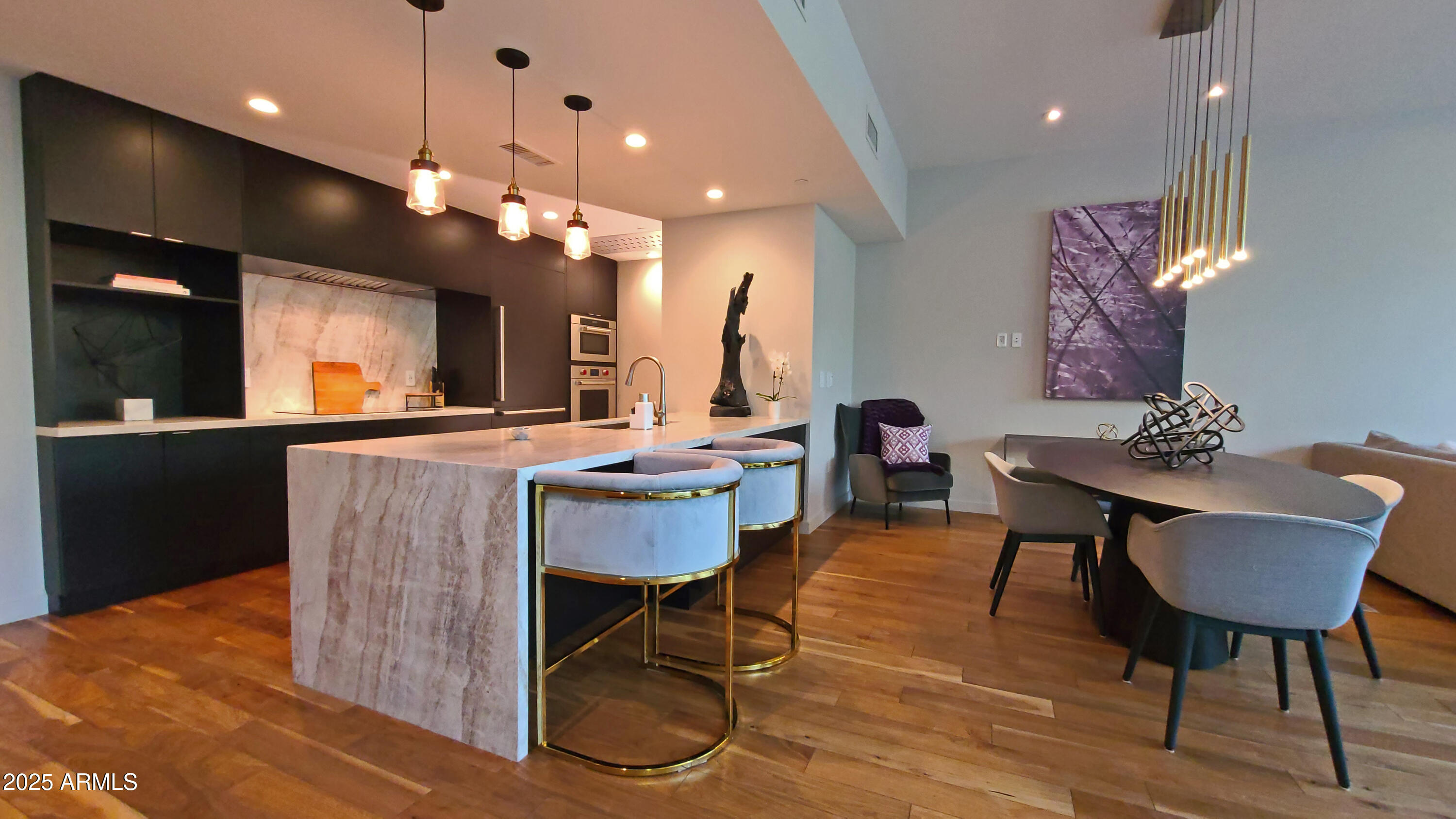 Luxurious Fully Furnished Loft-Style Living at Iconic Mountain Shadows Resort with Upgraded Contemporary Finishes. This Stunning Executive Condominium has a Modern Open Space Feeling with a Floor to Ceiling Wall of Windows to the Private East Facing Patio. The Sleek Stellar Kitchen and Entertaining Living/Dining Areas are Spacious and of Prime Design Quality. 2 Impressive Ensuite Bedrooms Located Upstairs (and can be accessed via elevator).  Main Bedroom has a Private View Balcony. 2 Generous Underground Garage Spaces plus Storage.  Located in Prime Paradise Valley, Mountain Shadows Resort Offering the Finest Amenities including Multiple Scenic Pools, Fitness Facility, Fabulous Dining/Restaurants, Golf and so much more. Mountain Views Surrounding this Resort are a World Famous Advantage.