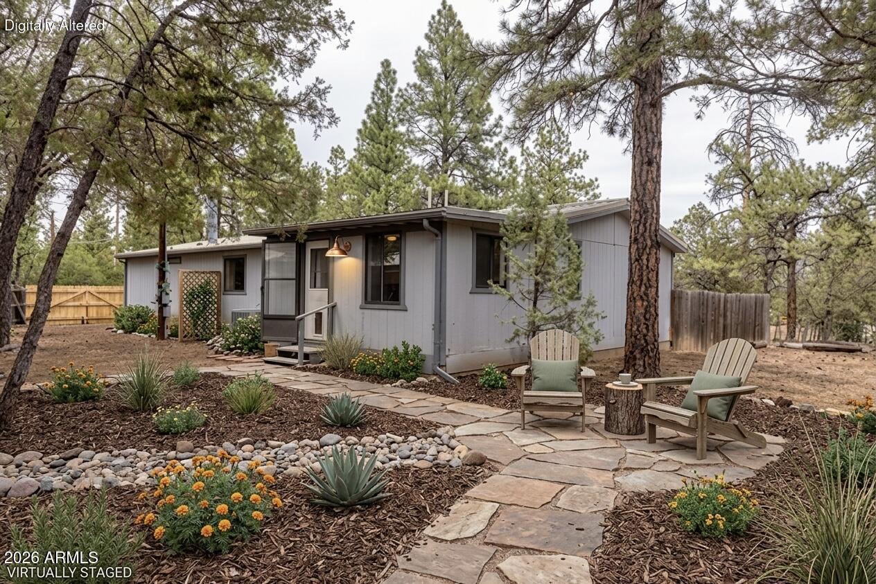 Escape the Phoenix heat and start making memories in the White Mountains! Tucked among the tall pines in beautiful Lakeside, this move-in-ready 3-bedroom, 2-bath retreat is the perfect getaway for weekend adventurers, summer vacations, or future full-time mountain living.

Recently refreshed with new paint, updated flooring, and modern cabinetry, the home combines cozy cabin vibes with the clean, updated feel today's buyers are looking for. The spacious 1,500+ sq ft layout offers comfortable gathering spaces for family and friends, while the fireplace creates the perfect setting for cool mountain evenings after a day on the lake or trails. Outside, the oversized, fully fenced lot provides plenty of room for RV parking, boats, ATVs, and all your mountain toys. Whether you're fishing nearby lakes, exploring hiking trails, or simply enjoying the cooler temperatures and peaceful pine setting, this property delivers the lifestyle so many Arizona buyers dream about.

Outside, the oversized, fully fenced lot provides plenty of room for RV parking, boats, ATVs, and all your mountain toys. Whether you're fishing nearby lakes, exploring hiking trails, or simply enjoying the cooler temperatures and peaceful pine setting, this property delivers the lifestyle so many Arizona buyers dream about.

This home offers the rare combination of affordability, usability, and turnkey condition, plus partially furnished, in one of Arizona's most loved mountain communities. Just pack your bags and start enjoying mountain life from day one.