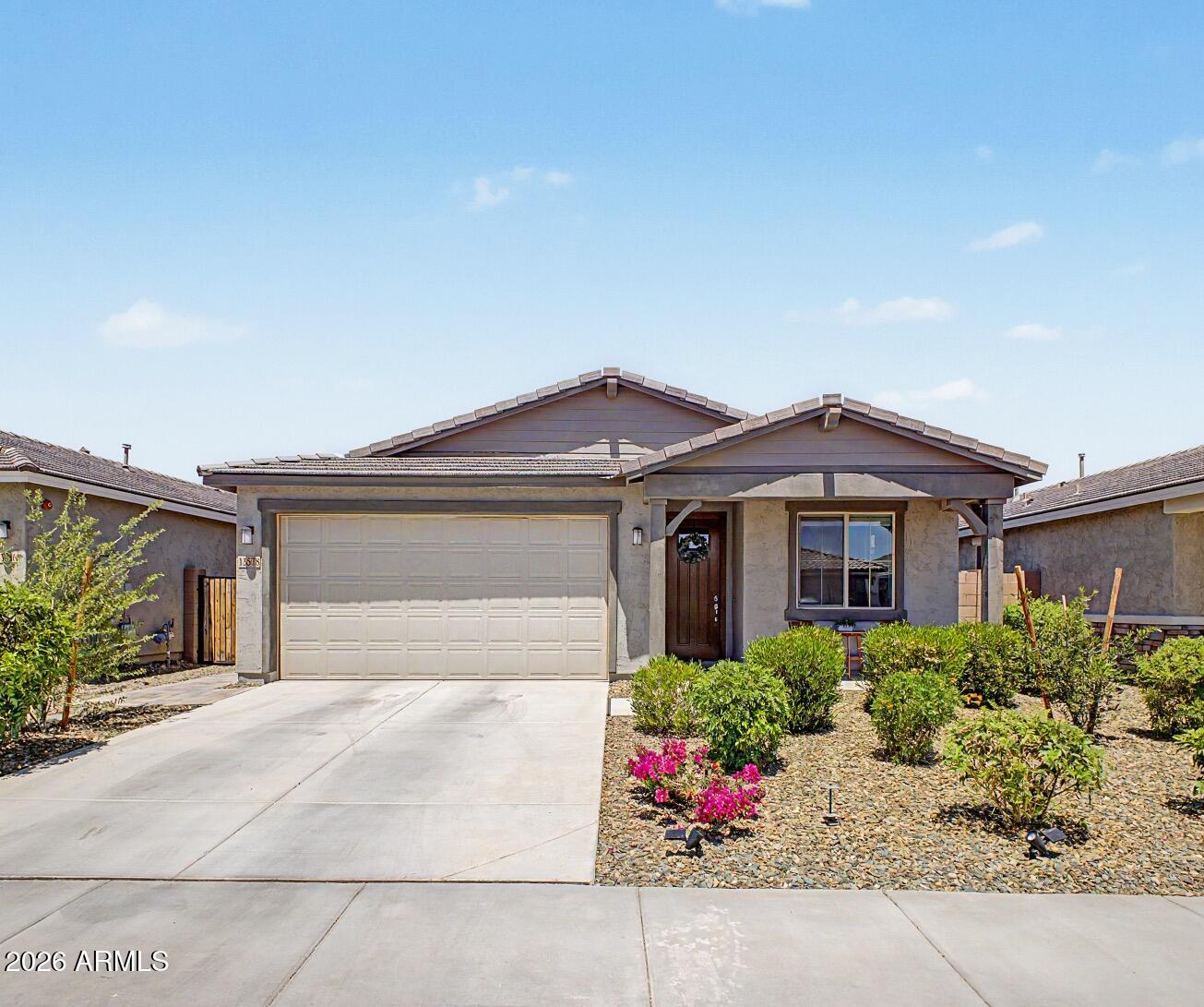 Why build new when you can buy MOVE IN READY with BUILT IN EQUITY?!? Discover effortless living and embrace the beauty of the serene desert in Vistancia. Built in 2023, this 1,627 sf Avalon model is the perfect starter home for a first-time home buyer, empty nester looking to downsize or a smart investment for investors. Featuring 3 bedrooms plus a private office/den, 2 bathrooms, low maintenance front yard and a fully landscaped backyard with cozy firepit, this home is truly ready for you to make your real estate dreams a reality. Loaded with builder upgrades, including gourmet kitchen, quartz countertops, tile backsplash, wood like tile flooring, and much more. This is a rare opportunity to live in a neighborhood with growing value, located in prime NW Peoria location, priced UNDER $500K