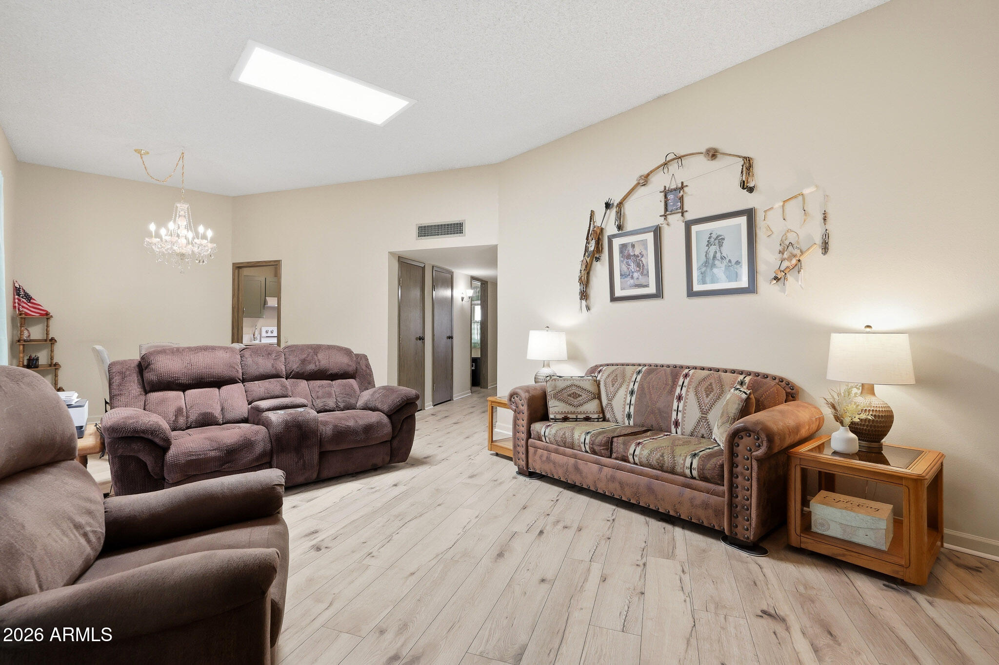 Bright, updated, and move-in ready condo/townhome in the heart of Sun City with thoughtful upgrades throughout. This inviting 2-bedroom, 2-bath home offers comfortable, low-maintenance living with new flooring, new windows, new sliding patio doors, and a remodeled kitchen and bathroom featuring modern finishes.
Natural light fills the home thanks to a solar tube that enhances the warm and welcoming atmosphere. The spacious layout includes an eat-in kitchen, generous bedrooms, ample storage, and a private covered patio perfect for relaxing or entertaining. all appliances included, a spacious, 1-car garage with built-in storage and laundry area, plus convenient access to Sun City's recreation centers, golf, pools, fitness facilities, clubs, shopping, dining, and medical services nearby. A great opportunity for buyers looking for an updated, move-in ready winter home or full-time residence in a vibrant active adult community.