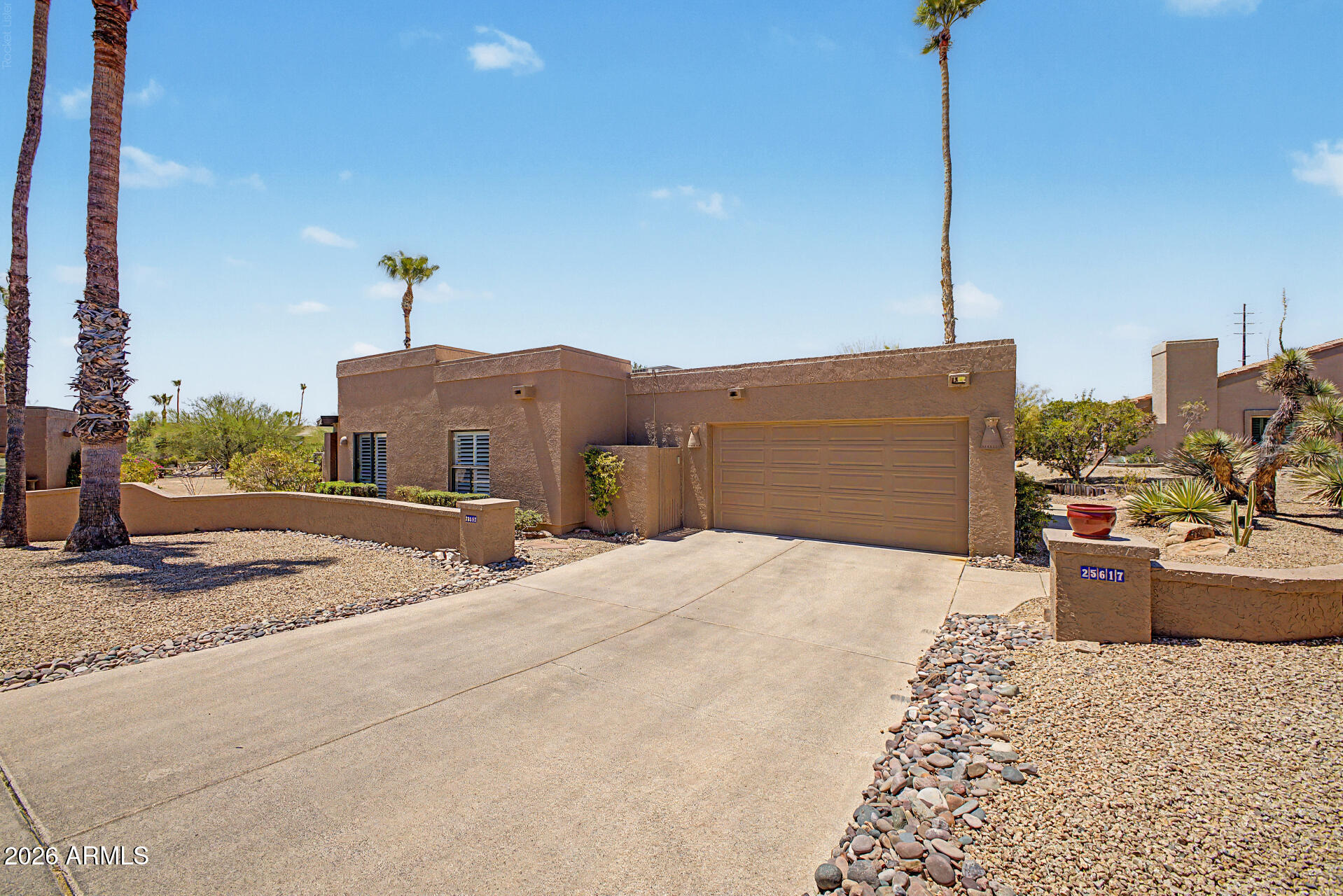 MOTIVATED SELLER!! Welcome home to your classic Southwest Hacienda dream home.  This spacious, updated home is tucked away on a quiet street and boasts over 2800 s/f, a large 1/3+ acre fenced lot, and a huge private extended patio for entertaining or simply enjoying the mountain views. Special features include an expansive private owner's suite w/ oversized primary bedroom, walk-in closet, and spacious primary bath with dual vanities and tiled walk-in shower.  The guest suite features an oversized bedroom, a dedicated bath with dual vanities, and a walk-in closet.  The third bedroom can be utilized as a den or fitness room and includes a built-in speaker system.  The kitchen includes granite countertops with rustic cabinets and a built-in desk. The inviting living room with fireplace flows directly into the large dining area with mountain views. Recent 2025 updates include the fully resurfaced and resealed roof with 8-year transferable warranty, new custom plantation shutters and new ceiling fans throughout (2026), new water heater and whole-house water filtration/softener system, new reverse osmosis drinking water system, and new kitchen refrigerator and touch faucet. Outside you'll find all new landscape irrigation, a garage bonus room that doubles as additional storage and your own private workshop, and new overhead garage storage racks.  Rio Verde is a self-managed adult community with a peaceful, rural atmosphere situated between McDowell Mountain Park and the Tonto National Forest just minutes from shopping in Fountain Hills and Scottsdale.  Community amenities include a lap pool/jacuzzi, tennis and pickleball courts, a new 2700 sq/ft fitness facility, exceptional dining options, onsite Post Office and Café/General Store, and two premier 18-hole golf courses.  Come enjoy the unique Rio Verde lifestyle!