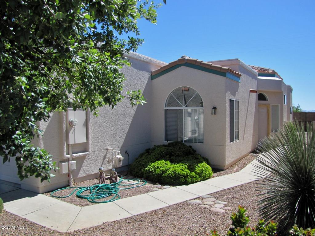 This beautifully maintained, 2BR/2BA/2CG, 1400 sq.ft. home in Sierra Springs is centrally located in Sierra Vista, AZ minutes from Ft. Huachuca, shopping and schools. The open floor plan has fresh paint, a gas-log fire-place, lots of natural light, new ceramic tile in the kitchen and a split floor-plan. The newly installed Parquet floors make this home a one-of-a-kind. The community swimming pool and spa are just steps away. The exterior has been freshly painted and the roof was just re-coated. This is a beautiful, quiet community. Call today.