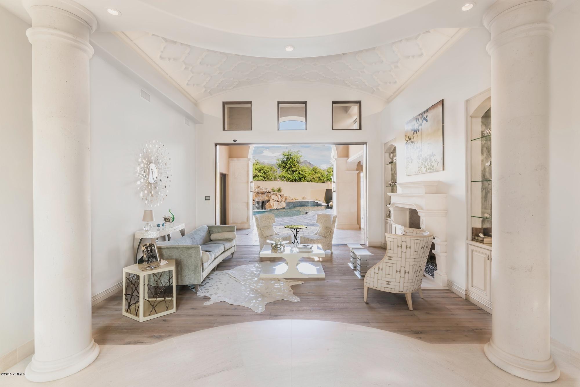 Amazing newly finished Custom Home on a private 2/3 acre cul-de-sac lot in the highly desirable Arcadia neighborhood of Silverleaf.   This incredible home has a functional floorplan with high-end finishes and a contemporary feel throughout.  Highly detailed & designed finishes & architectural elements include Custom Ceiling Treatments, Walker-Zanger tile, limestone/white oak/walnut/marble flooring, 7 Zone HVAC, Crestron/Lutron system, Gourmet Kitchen with 60'' Wolf Cooktop & Pasta Maker, Fully Equipped Theater Room and electronic sliding glass doors with sensors that pocket into the wall for incredible indoor/outdoor living. The Resort Style Backyard features a large salt water pool with stone grotto and a two story hidden spiral slide, outdoor kitchen, sport court and large grass area.