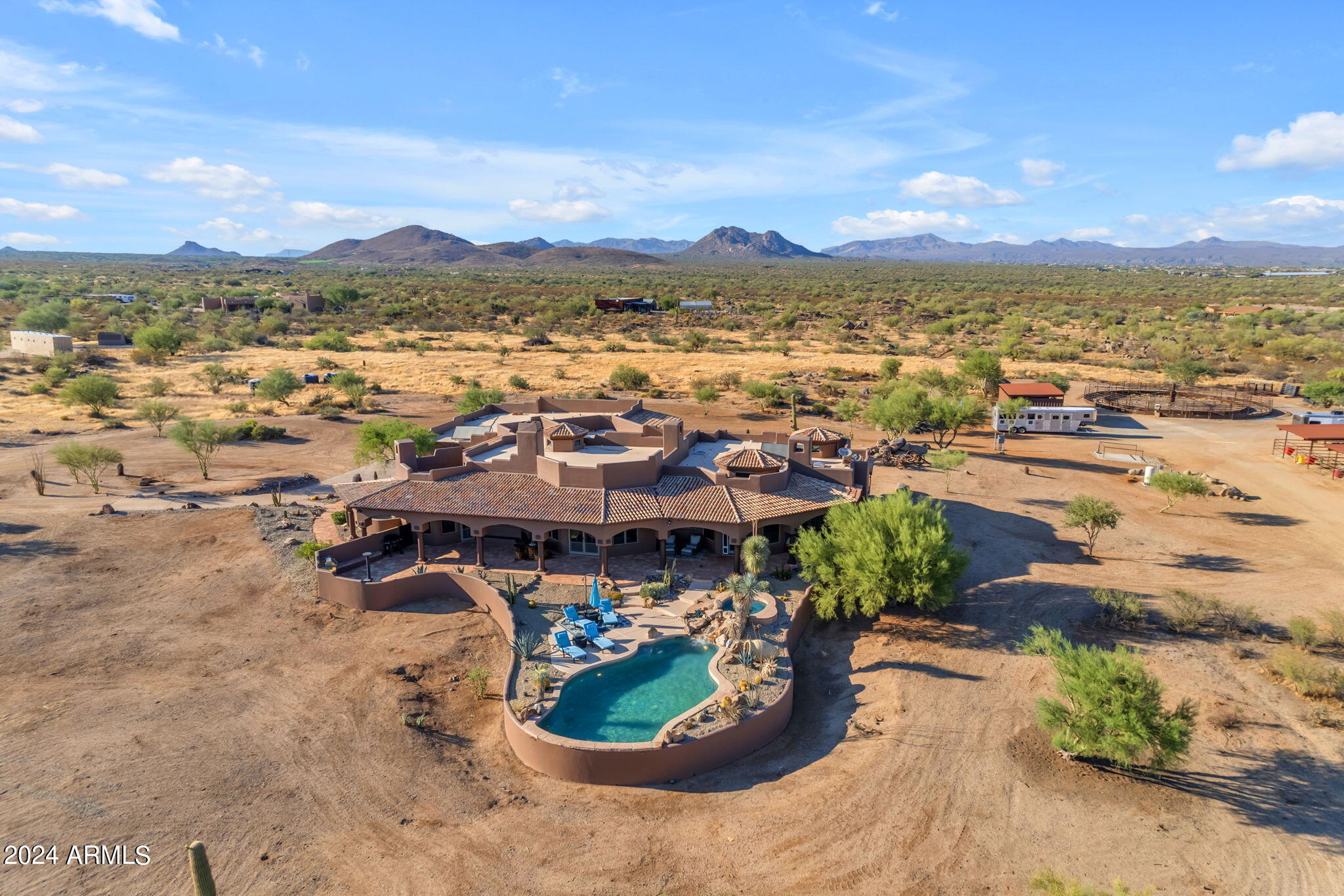 PRICED $425,000 UNDER recently appraised value!!

***Back on market. Buyer could not perform***

Privacy, scale, views, and location--this is Scottsdale desert living at its finest.

Take advantage of the rare opportunity to own one of the last large parcels in the City of Scottsdale--just over 18 pristine acres overlooking the McDowell Mountain Preserve. Set at the end of a paved road, this exceptional property delivers unmatched privacy, serenity, and truly breathtaking desert views in every direction.
The land itself is a showpiece, adorned with the dramatic granite boulder formations that define the McDowell Mountain region and the Sonoran Desert's iconic landscape. Outdoor enthusiasts will appreciate immediate access to miles of non-motorized trails for hiking, biking, and horseback riding - right from your doorstep.

At the center of the property sits a thoughtfully designed 4,700 sq ft custom home that blends seamlessly with its natural surroundings. Recently updated with a new roof, the residence features expansive windows and doors in nearly every room, framing sweeping 360° views of Four Peaks, Granite Mountain, the McDowell Mountains, and the surrounding desert.
The primary suite offers its own fireplace and private exit to the pool and spa, perfectly positioned to capture views of Tom's Thumb. A guest suite and attached casita open to the north patio with stunning Granite Mountain vistas. The spacious great room, chef's kitchen, and custom wet bar create an ideal setting for entertaining or quiet desert evenings by the fire. The large attached casita is fully equipped with private access--perfect for extended family or guests seeking both connection and privacy.
Equestrian amenities are equally impressive. The property features a 12-stall mare motel with 60' runs, lighting, and automatic waterers, situated beside an 8-horse Priefert walker. The expansive 150' x 300' arena offers new footing and ample trailer parking for riding, roping, or hosting friends. A brand-new high-producing well adds significant value and reliability.
Surrounded by prestigious luxury homes and ranch estates, this peaceful desert retreat is just minutes from world-class golf at Troon North, Desert Mountain, and Estancia, as well as Scottsdale's renowned dining, shopping, and cultural attractions.

Apprasial available upon request
