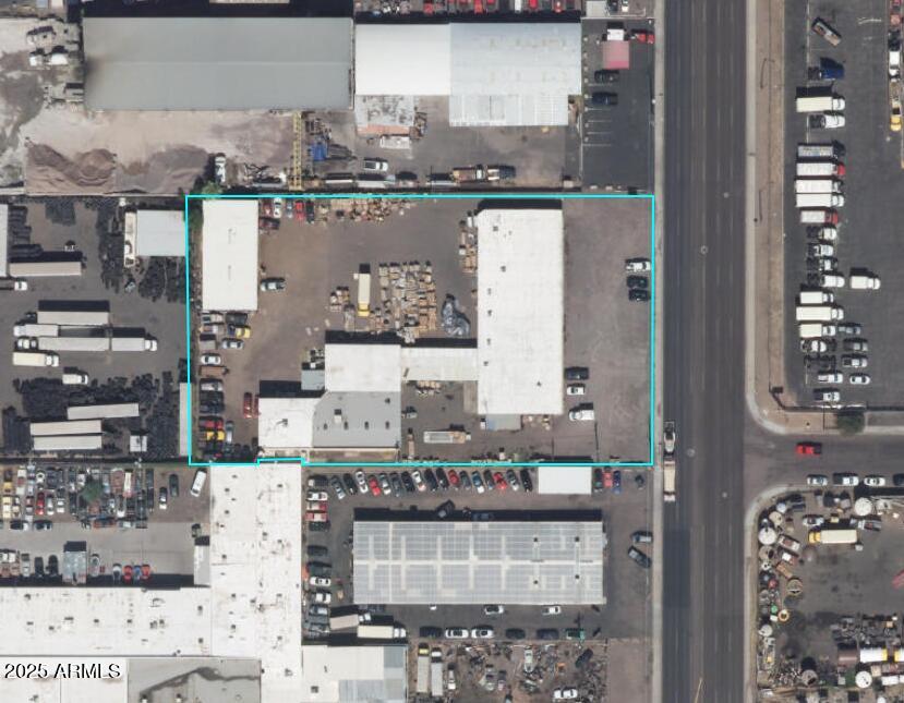 Located near Grand, I17, & I10. Zoned I-1, Over 1 1/2 acres. 5 structures: block wall building, wood/steel- back buildings. 3 lrg Covered stalls w/3 phase Air, Water, Power, & Gas. Interior gated yard area S side & N side of middle buildings. Perfect for warehousing, manufacturing, industrial, as well as retail offices incldng restaurant/bar w/plenty parking front & back. Back gated w 2 large roller gates. NEWER ROOF, NEWER AC units. Front bldg set up currently for gray scale space w/bathrooms, 2 sep offices, & end unit auto/ mechanic area w 1 bay & garage, yard, large warehouse w loft offices/storage. Back building w/4 large bays, 2 story building w/office. All equip w/bathrooms, sep power met & AC, water usage meter- rest/bar. Property will be cleared before buyers possession.