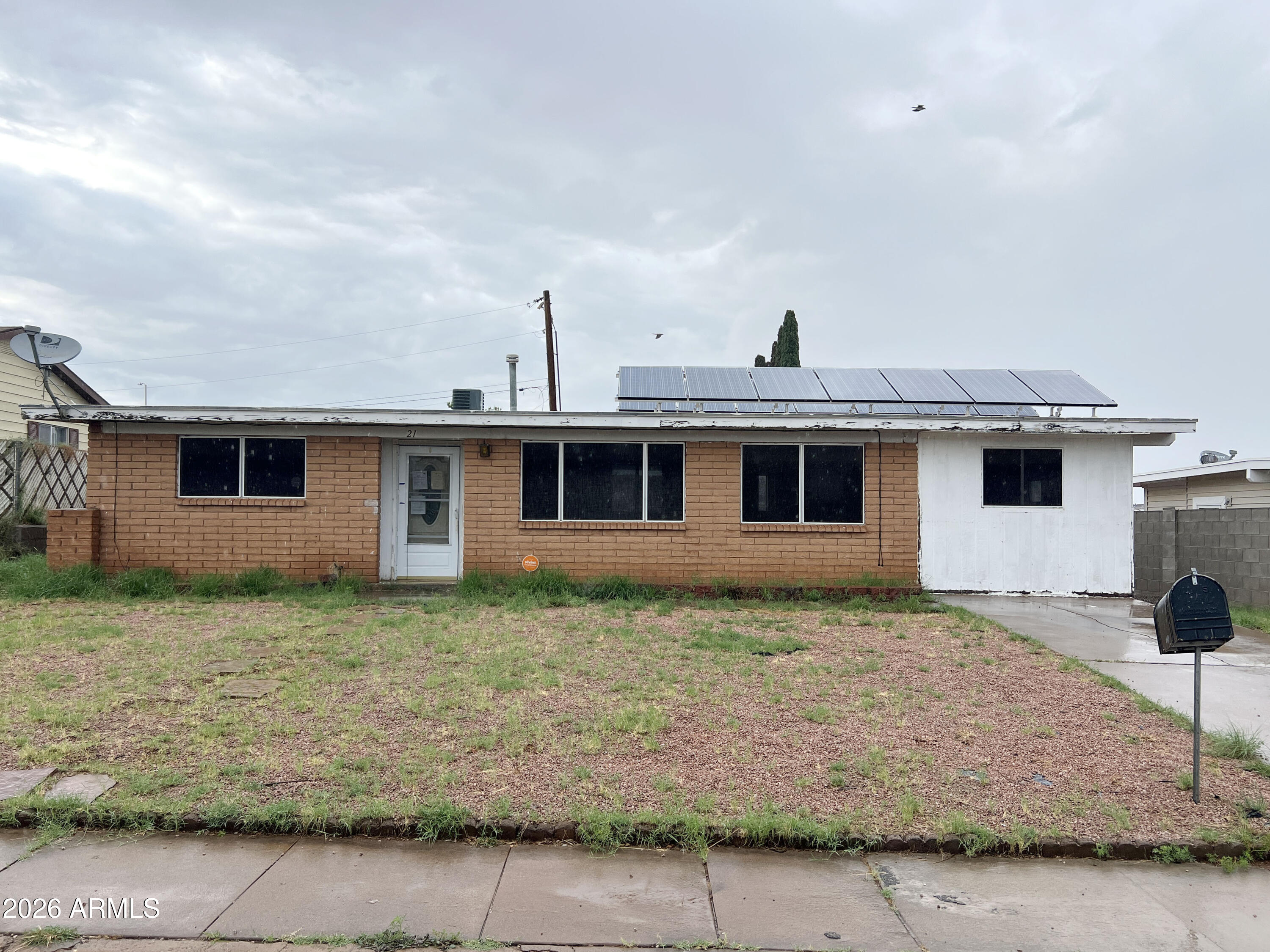 Opportunity awaits with this 3-bedroom, 2-bath home located in an established Sierra Vista neighborhood. Featuring a spacious lot, large backyard, detached storage shed, and owned solar system, this property offers excellent potential for an investor, renovator, or buyer looking to build equity through improvements.

Inside, the home offers a functional floor plan with a generous living area, eat-in kitchen, and abundant natural light. The property is in need of repairs and updating throughout, making it an ideal candidate for a renovation project or investment opportunity.

The expansive backyard provides ample space for outdoor living, gardening, storage, or future enhancements. Conveniently located near schools, shopping, dining, and Fort Huachuca. Property is being sold in its current condition. Bring your vision and transform this property into something special.
