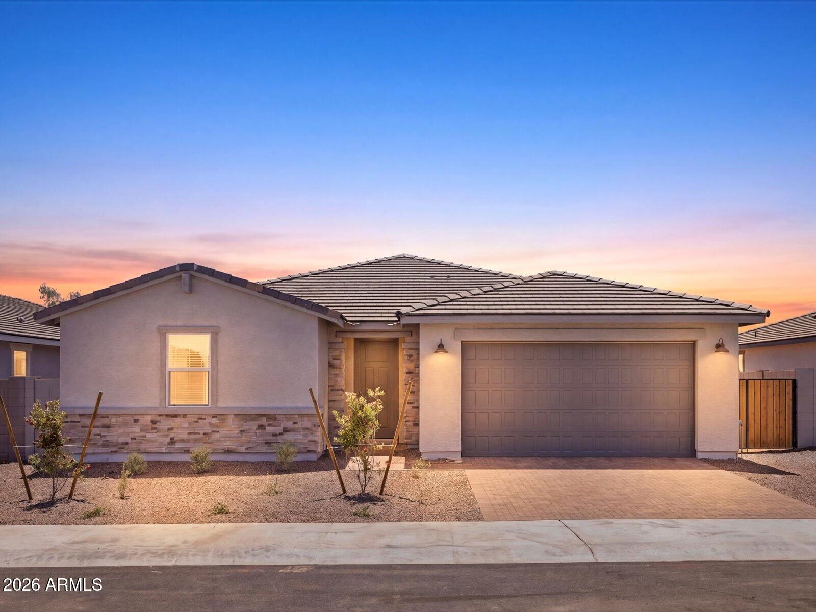 Discover the perfect blend of space, style, and convenience in this beautiful Amber floorplan. This thoughtfully designed single-story home offers 4 bedrooms, 2.5 baths, 3-car Tandem garage. Enjoy outdoor living with a large covered back patio. This home has a SPA Shower, GOURMET KITCHEN, Barnett Blouder-color cabinets, quartz kitchen counter, tile backsplash, wood-like tile floor, carpet in bedrooms! INCLUDED-washer, dryer, window blinds, refrigerator and MORE! EXCLUSIVE community amenities! Built with innovative, energy-efficient features designed to help you ENJOY more SAVINGS!