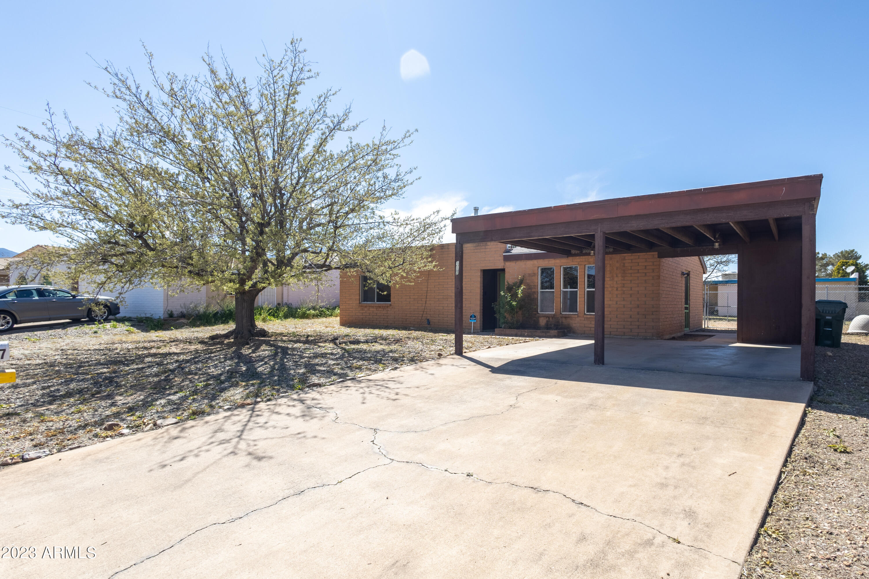 Charming 2 bedroom, 2 bath house just minutes from Fort Huachuca! Eat in kitchen, fireplace, vaulted ceilings and storage shed. The backyard features a spacious outdoor living area with a gazebo, enclosed by a chain link fence. Roof updated in 2022.