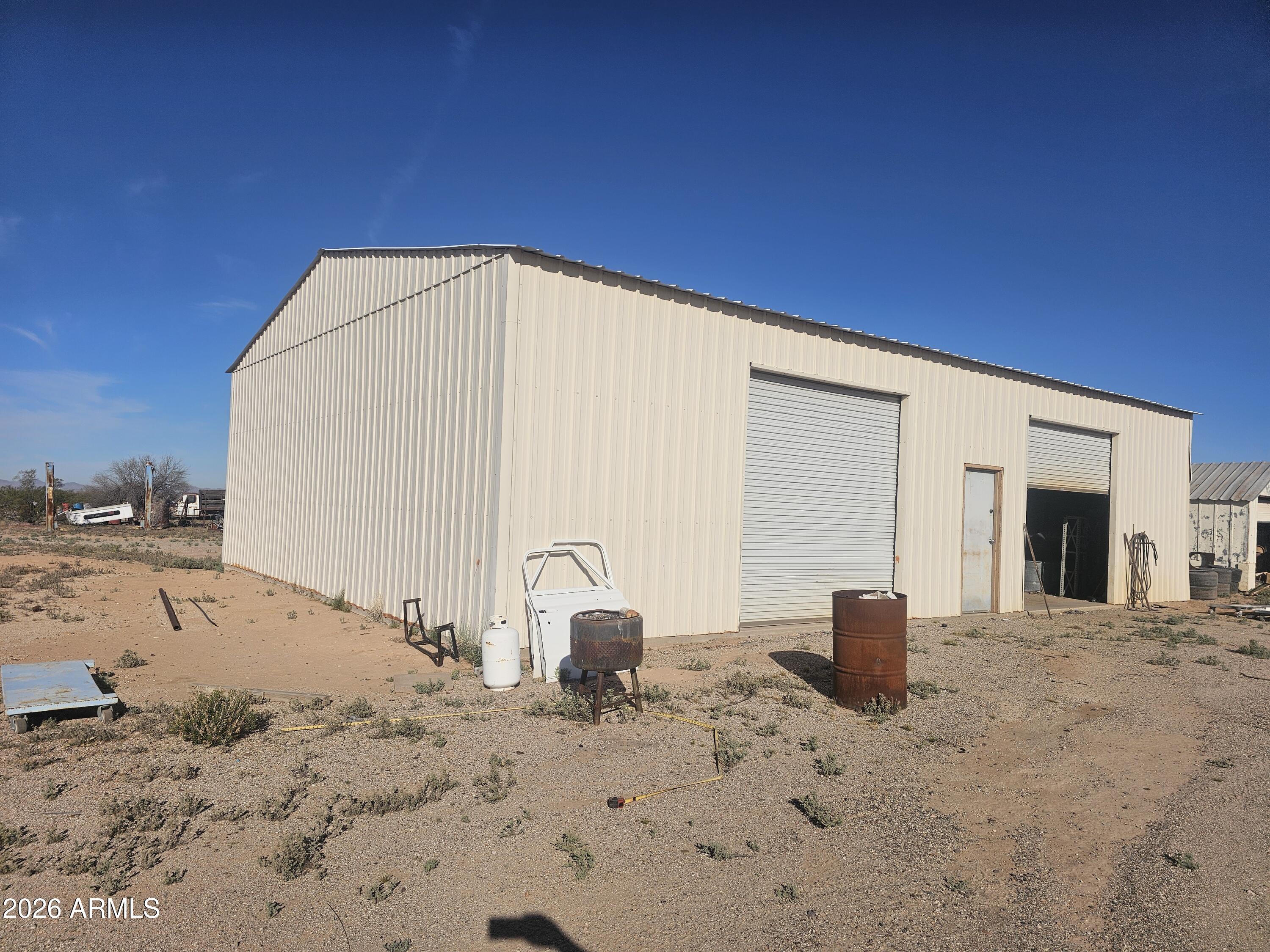 Home not mortgageable in current condition. Remodeling started and drywall nearly done. HVAC two years old.

1800 square foot detached workshop with electric and two rolling doors.