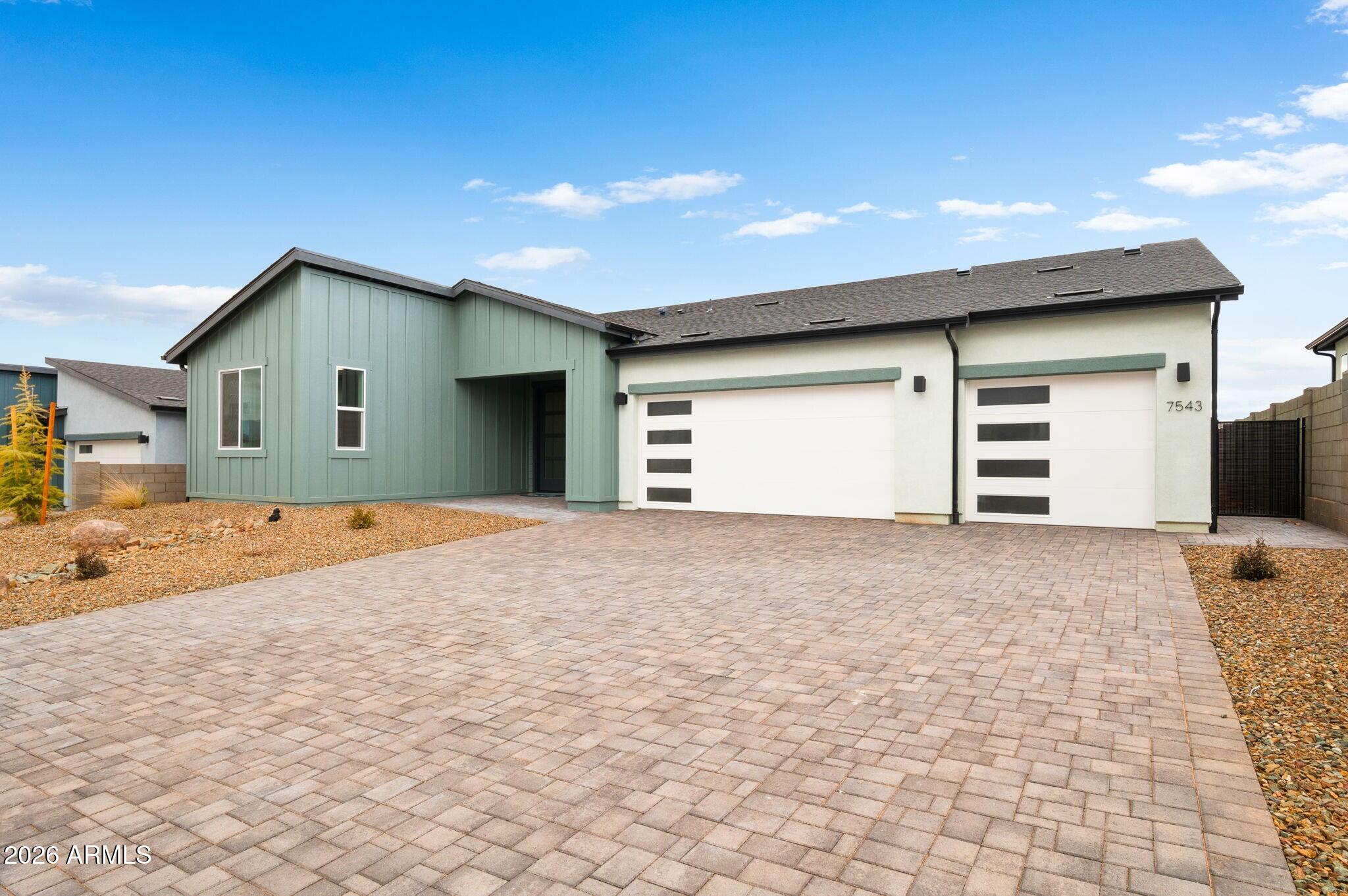 Designed with both privacy & comfort in mind, this thoughtfully crafted 2,002sf home features a desirable split floorplan with the primary suite positioned on one side of the home and the secondary bedroom & private study (or optional 3rd bedroom) on the other. This layout creates an ideal balance for guests, home office, or multigenerational living while maintaining a sense of separation and tranquility. At the heart of the home, an oversized great room serves as the central gathering space, seamlessly connecting the kitchen, dining area, & covered patio for effortless entertaining & everyday living. Enhanced finishes throughout add a touch of sophistication, while the spacious 3-car garage provides plenty of room for vehicles, hobbies, and storage. Combining flexible living spaces, thoughtful design, and modern comfort, this home offers a lifestyle that is both functional and refined.  ECCO homes are designed to minimize energy consumption and cut back on costs while also providing a healthier and more sustainable living environment. Some of the energy-efficient features that come standard in our homes include:

ENERGY STAR® Compliant Home: Our homes meet the rigorous energy efficiency standards set by the U.S. Environmental Protection Agency, ensuring that they are among the most energy-efficient homes for sale in the country.
Spray Foam Wall (5") and Ceiling (8") Insulation: Our homes feature advanced insulation systems that help reduce heat loss in the winter and heat gain in the summer, keeping your home comfortable and energy efficient.
ERV (Energy Recovery Ventilator) for Energy-Efficient Fresh Air Exchanges: Our ERV systems provide a continuous supply of fresh air while minimizing heat loss and energy consumption.
Programmable Wi-Fi Thermostat: Our heat pump systems are designed to provide efficient heating and cooling while minimizing energy consumption.
Jumper Ducts: Our jumper ducts help improve airflow and reduce energy consumption by minimizing heat loss and heat gain.
40-Gallon Electric Hot Water Heater with Recirculating Water System: Our hot water heaters are designed to provide a constant supply of hot water while minimizing energy consumption.
Electric Range: Our electric ranges are energy efficient and easy to clean, making them a practical choice for busy families.
Low-VOC Paint: Our homes feature low-VOC (volatile organic compound) paint, which helps improve indoor air quality and reduce the risk of health problems.

At CCO Homes, we believe that a healthy and comfortable living environment is essential for families. That's why our philosophy is rooted in green building technologies that promote cleaner air, reduced energy bills and a more sustainable future. Our Prescott Valley home designs provide healthier indoor air quality, which is especially important for families with young children and pets.