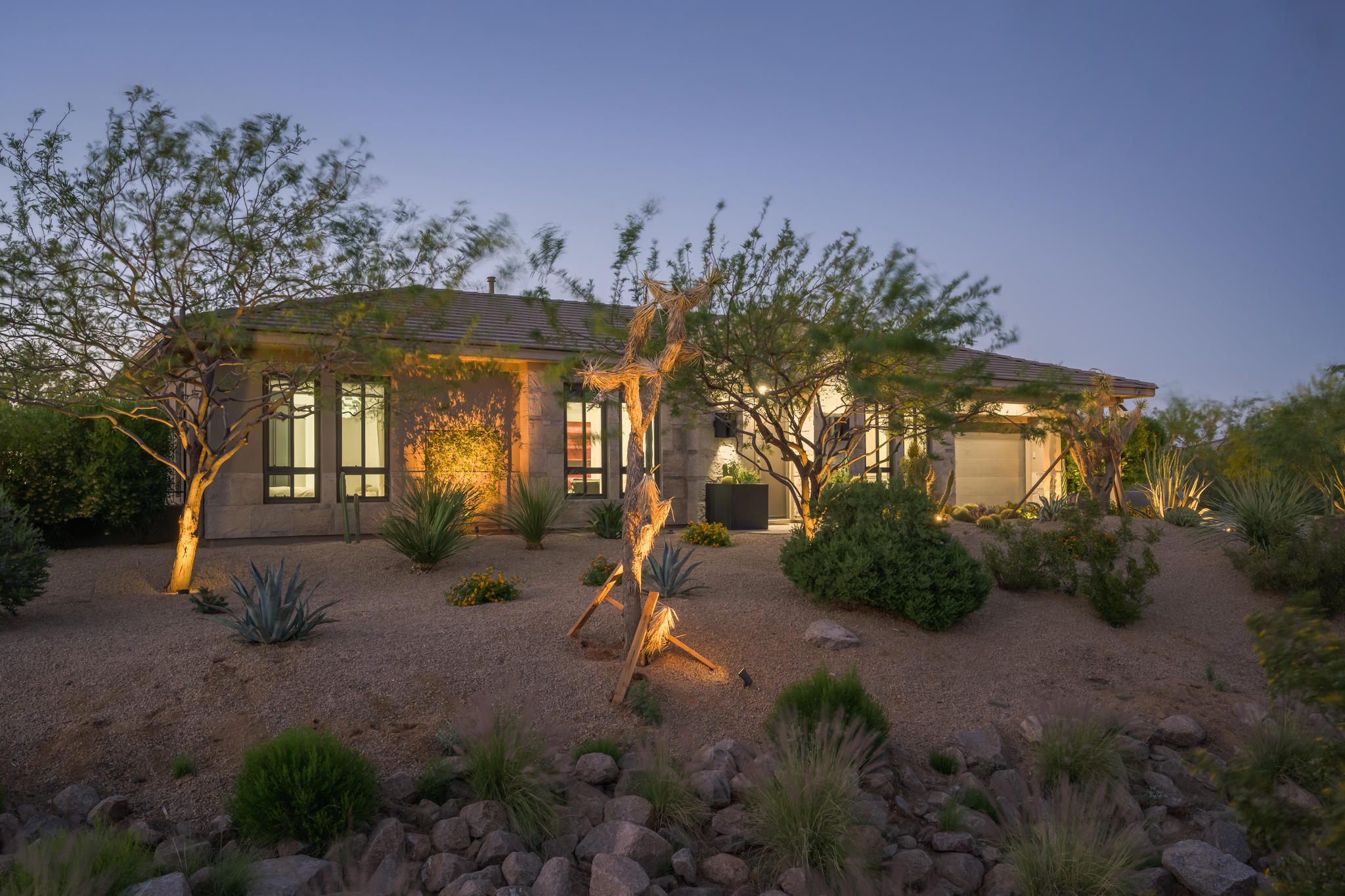 Classic contemporary designed by world renowned architect Piet Boon. This 5bedroom, 4.5 bathroom luxury home is located in the gated community of Boulder Mountain Estates. The ''WOW'' factor begins upon entering this magnificent home. Floor to ceiling, accordion sliding doors surround the formal dining room, large kitchen and family room blending the indoor and outdoor living spaces seamlessly. Total of 4,408 SF w/ 3,874sq ft of living space in the main house with a detached 540sq ft, one bedroom casita. Countless Features include gourmet Kitchen Fitted with frameless, high-gloss contemp cabinetry, built in coffee machine and Limestone counter tops, with upgraded Smart features thru-out!  The backyard is the epitome of resort living, which boasts a therapeutic spa, Ozone pool & much more!