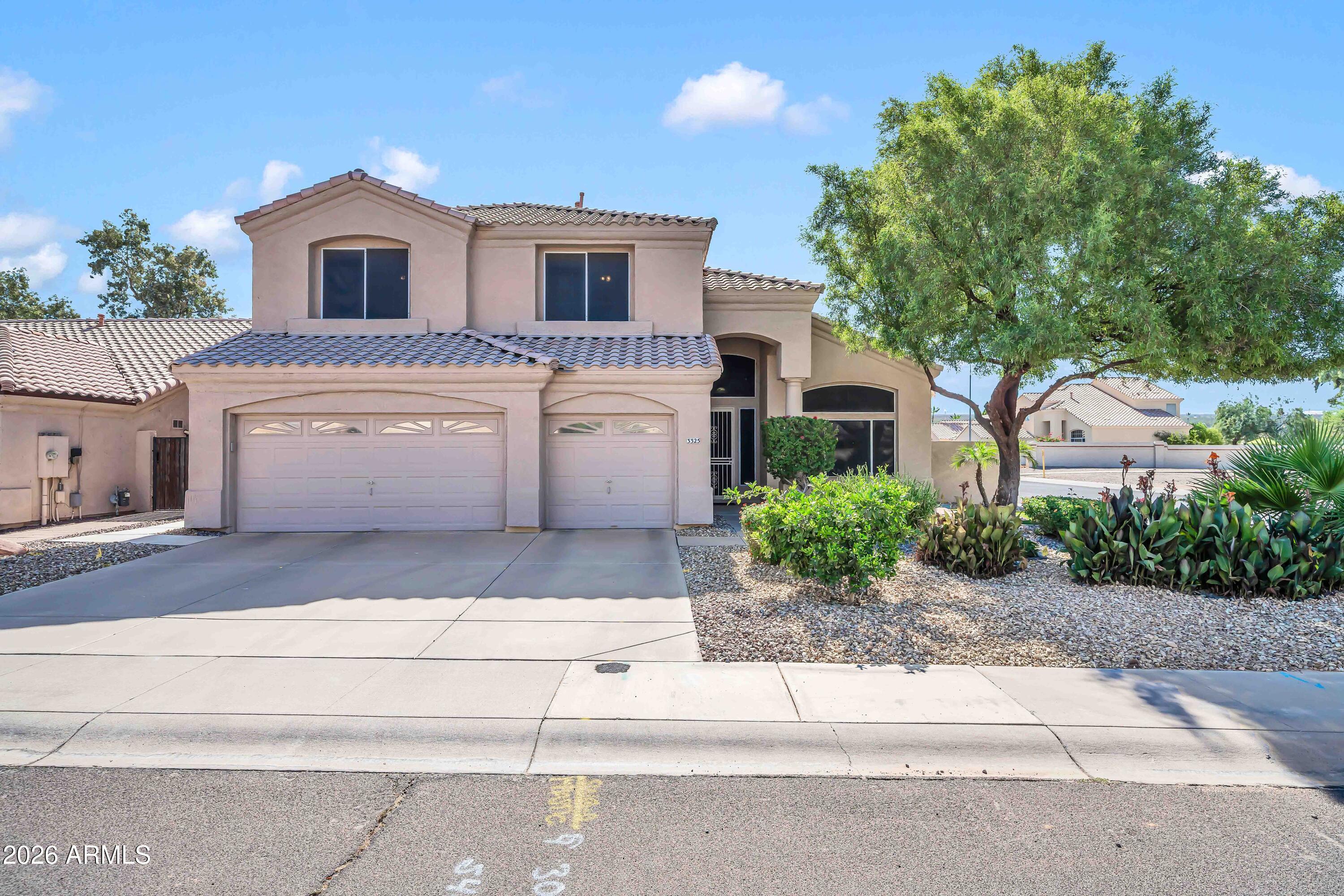 Price reduction on this beautiful, spacious, single- family home with refreshing pool which is completely shaded in the afternoon.  The view from the breakfast table includes the pool surrounded by flowering shrubs and trees.  Your whole family will enjoy being together in the great room with kitchen and breakfast bar.  There is plenty of cabinet space in the kitchen along with built-in desks for homework. The primary bedroom is also downstairs, with its ensuite bathroom, roll-in shower, and his and her closets.  Upstairs you have 3 big bedrooms with extra-large closets, another bathroom, and a huge bonus room which is convenient for multi-generational living.  The community lakes and play areas are lovely and well kept.  You will love making this your new home.
