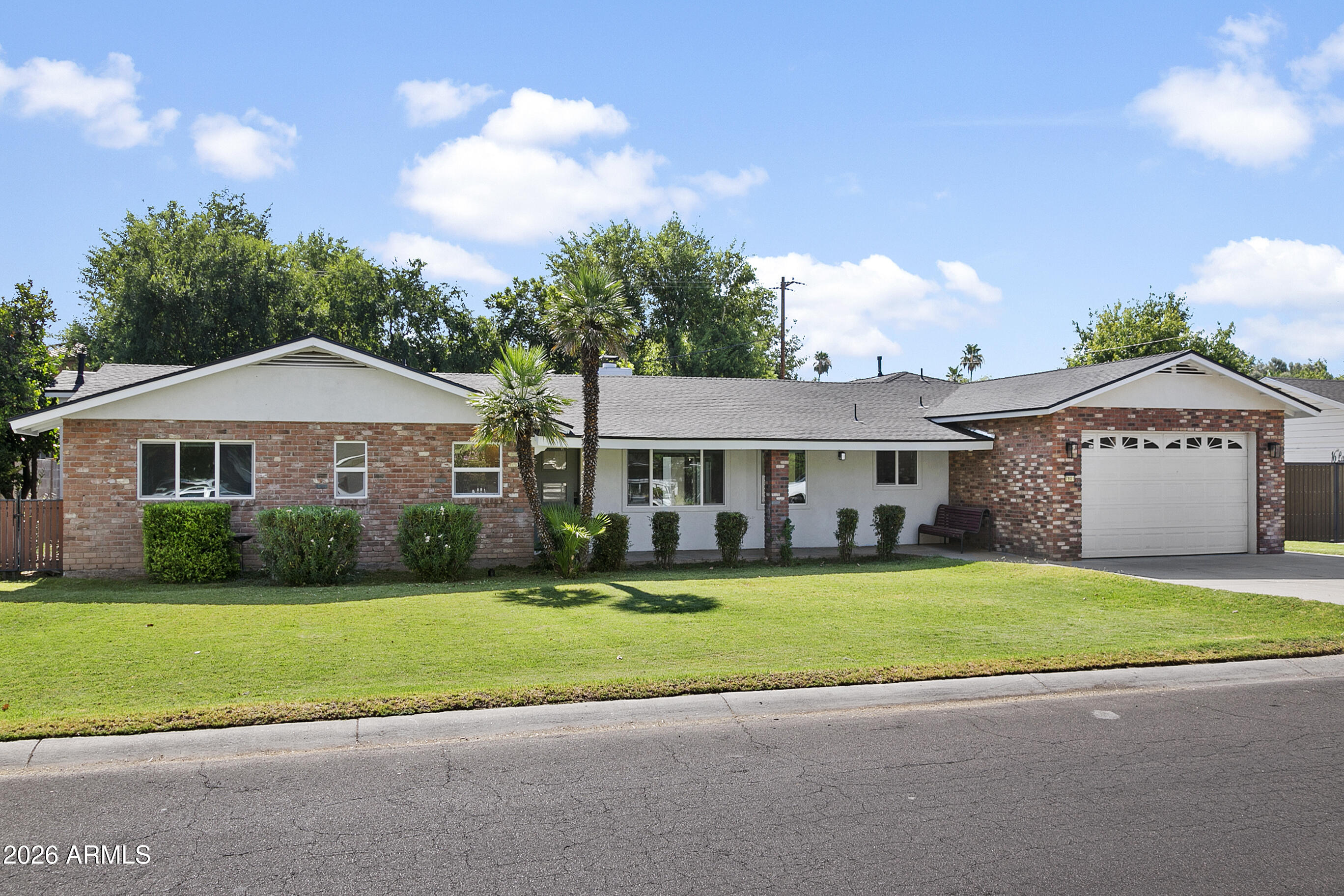 Stunning 2025 Remodel with Guest House & NO HOA! 
Welcome to this masterfully renovated 4,041 sq ft single-level home! Major 2025 updates include a new roof, HVAC, wiring, dual-pane windows, and modern flooring. The expansive no-step layout features a cozy fireplace, a versatile game room, and two primary suites. The chef's kitchen impresses with dual islands, quartz countertops, multiple ovens, and a gas cooktop.

A true standout is the 568 sq ft detached guest house, complete with its own kitchen and private entrance, ideal for multi-generational living or rental income! Step outside to a massive 14,288 sq ft lot featuring a covered patio, lush flood-irrigated grass, and three mature orange trees. Complete with an attached 2-car garage and an energy-efficient tankless water heater!