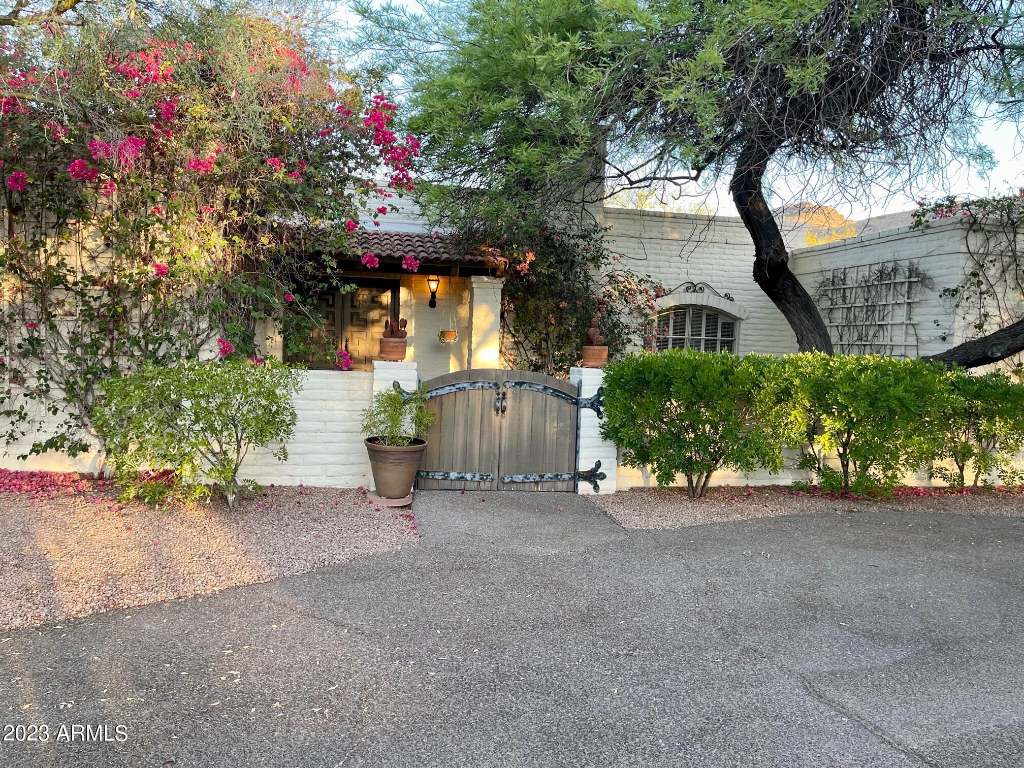 The true value of this property right now is its excellent PV location with views of Camelback Mountain. Very quiet neighborhood in the foothills of Mummy Mountain perfect for a new build!