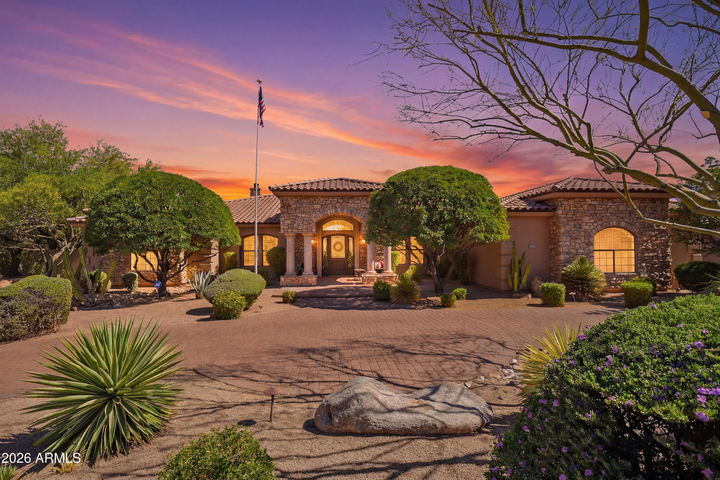 Extraordinary Custom Estate with Detached Casita! Built by a luxury homebuilder, this one-of-a-kind property offers approximately 6,100 sq. ft. of living space, including a 4,100 sq. ft. main home and nearly 2,000 sq. ft. detached casita with private entrance. Features include hand-scraped alder wood floors, Turkish travertine, vaulted ceilings, custom cherry cabinetry, granite throughout, and an open floor plan designed for entertaining. The luxurious primary suite includes dual walk-in closets, Jacuzzi tub, and coffee/wine bar. Resort-style backyard with pool, spa, fireplace, and built-in BBQ. Steel-girder construction, whole-house water purification, and endless possibilities for guests, world class podcast studio, multigenerational living, office, studio, theater, or gym.