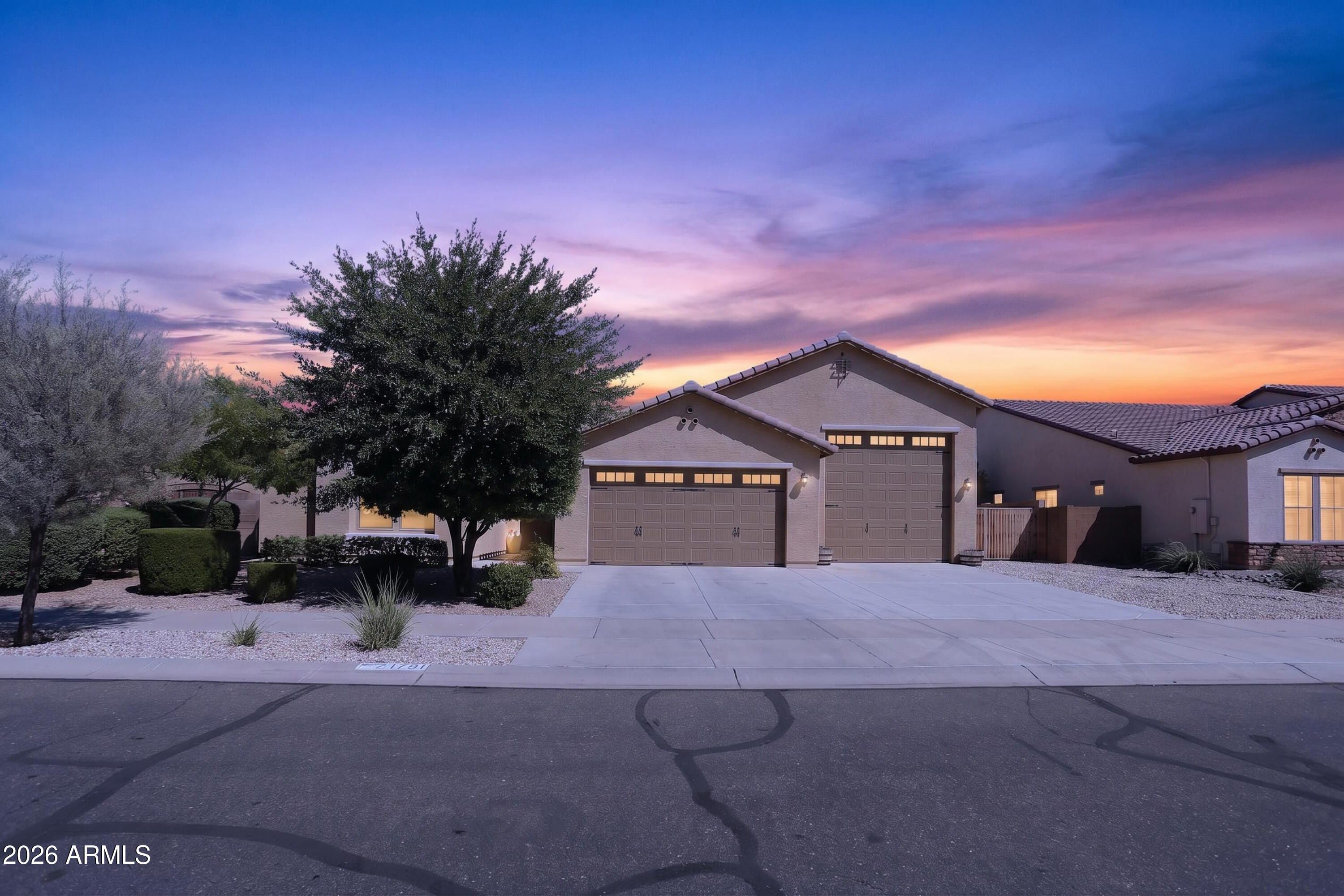 Gorgeous 3 Bedroom + Den w/murphy Bed features a long list of upgrades: Wood plank tile, soft close drawers, staggered kitchen cabinets w/42'' uppers & an extended laundry room.  Large Island, Split floorplan, Giant walk in closets. Whole-house water filtration system, reverse osmosis & water softener provide pure, refreshing water throughout. Full 3-Car PLUS 40' RV Super Garage has room for all your toys. Garage is upgraded with additional insulation in the ceiling, walls & doors, (2) 220V/50-Amp outlets, sink & service door. Step outside to your private backyard oasis - designed for relaxation & entertaining. Cool off in the sparkling pool with custom baja shelf, gather around the sunken card table, or unwind on the travertine deck surrounded by easy-care landscaping & synthetic turf. Pre-prepped for a pool heater. 
The home sits on nearly a quarter of an acre & includes two usable side yards. The smaller is currently used as a dog run, is fenced in & features recycled professional stadium turf as well as an area for real grass. The area gets the morning sun so it's also great for an additional play area or gardening area. A 12-foot gate opens into the larger side yard, where there is room for additional storage, parking & large garden.

All included appliances are Energy Star. HVAC is Seer 16, with 3 zones for maximum efficiency. 2x6 exterior structure, with R19 insulation in all walls.

 The community features multiple playgrounds, walking paths & is a short distance to the community library, baseball/soccer fields, frisbee golf & top-rated elementary school. Minutes to 303, Fry's grocery store & lots of dining options