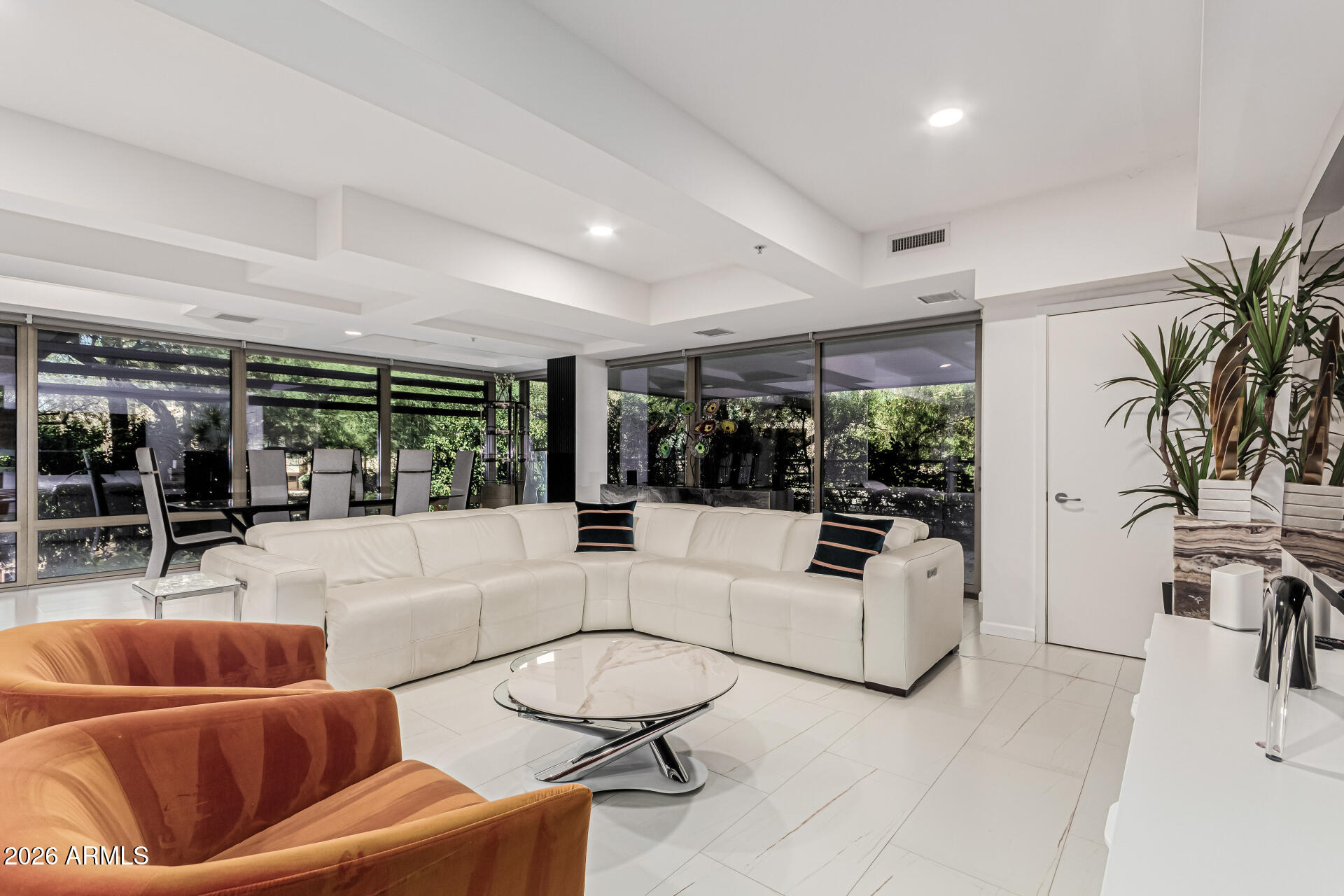 Motivated seller and furniture included with sale of this Optima condo. One of the largest floorpans in the building nestled in a corner with a unique and extremely private view. This unit has had recent flooring and lighting upgrades and is being offered furnished. This unit comes with a rare 10x10 on site storage unit and two parking spots. Great investment opportunity as the unit was recently leased for 5 figures. 

Known for its amenities, residents of the Optima enjoy concierge service, gated parking, a state-of-the-art fitness center, steam and locker rooms, an indoor pool and spa, two outdoor zen pools, racquetball and basketball courts, a putting green, dog park, and an on-site restaurant. All of this, just seconds from premier dining, shopping, and entertainment in Old Town.