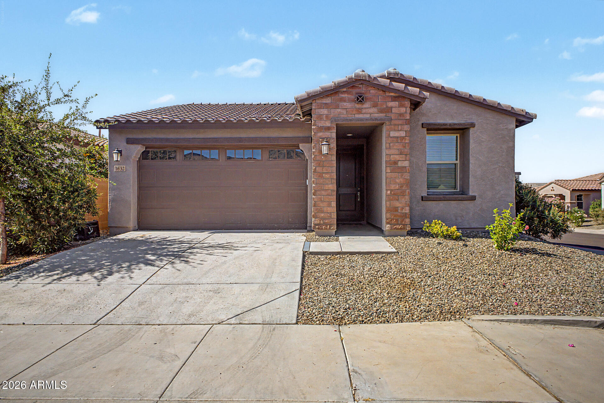 Step into this beautifully maintained, 2021 Lennar home located in the desirable Dobbins Heights community. Gently lived in and thoughtfully designed, this spacious 5-bedroom, 3-bath residence offers modern comfort and style throughout. The open-concept kitchen is a standout, featuring sleek brown cabinets with silver hardware. Uniform colors throughout home. Corner lot facing south. Mountain Views in a gated community. Step outdoors into the patio with thoughtfully designed low maintenance outdoor living.