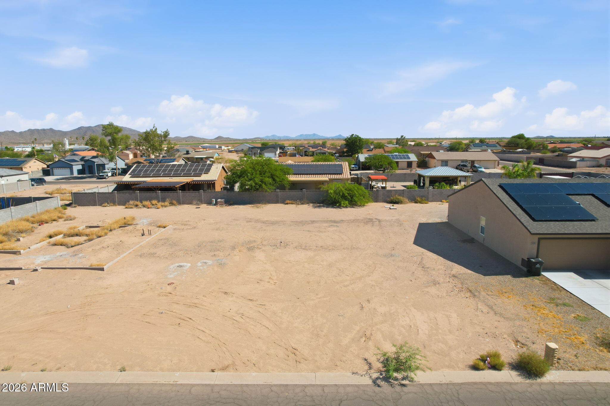 No HOA! Affordable lot with nearby utility access and a convenient location near I-10 and I-8, making commuting to Phoenix or Tucson easy. Arizona City offers small-town living with convenient access to major metropolitan areas. Buyer to verify all material facts, including utilities, zoning, boundaries, and intended use.