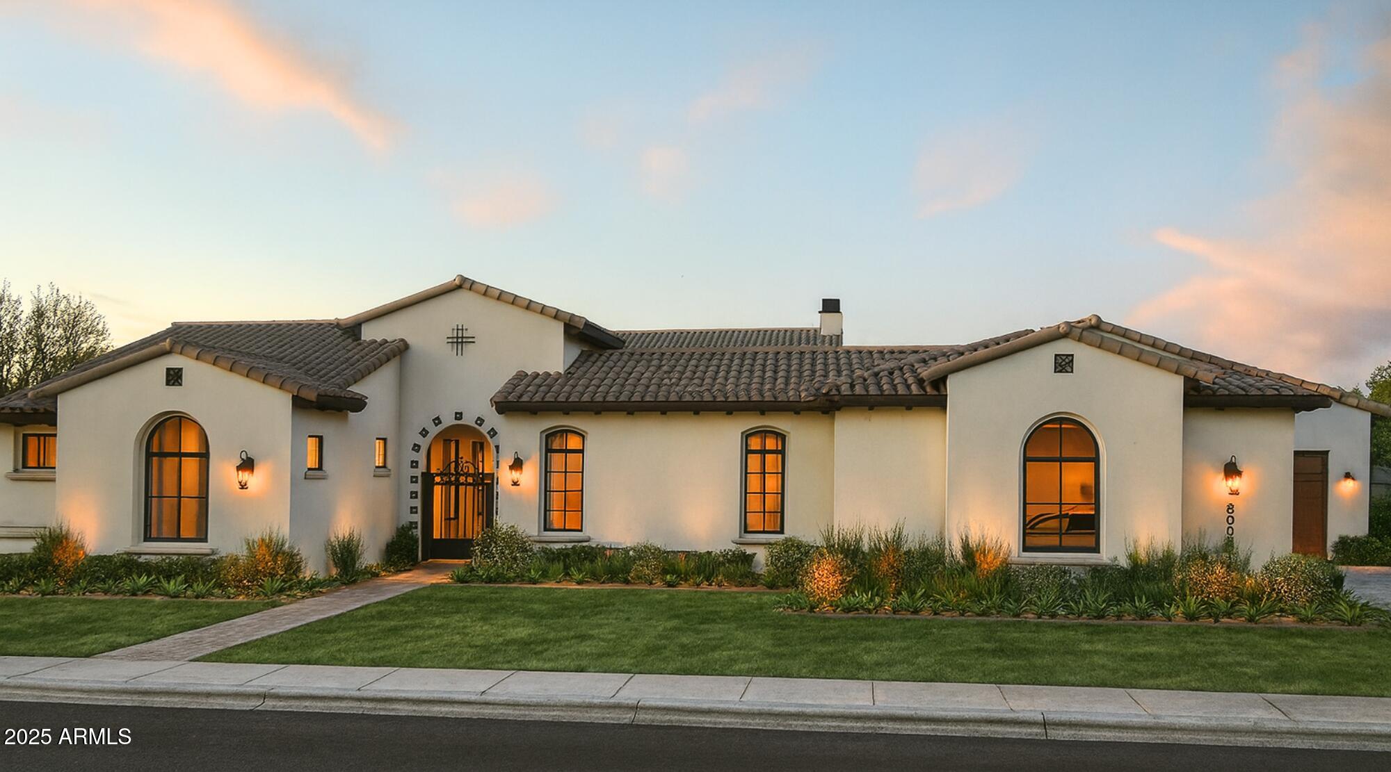 PERMIT RECIEVED!! Rare 6-car garage opportunity paired with a thoughtfully designed floorplan that maximizes Arizona's incredible year-round weather. This exceptional residence by Thomas James Homes offers preferred pricing and the ability to personalize select design finishes while securing a premier Scottsdale location. The Santa Barbara-style estate showcases timeless elegance with wide-plank wood flooring and expansive open living areas created for seamless indoor-outdoor living. Retractable glass doors connect the great room to resort-style outdoor spaces, perfect for entertaining and everyday enjoyment. The chef-inspired kitchen features Wolf and Sub-Zero appliances, a spacious island, and a dedicated prep kitchen. Outdoor amenities include a sparkling pool, spa, firepit & kitchen.