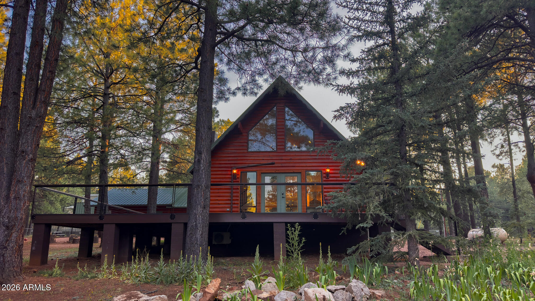 Welcome to this extensively remodeled mountain retreat, offering 1,952 square feet of thoughtfully updated living space. Originally built in 1985, this home underwent a comprehensive renovation in 2025, with improvements extending from the foundation to the roof.
Major structural and environmental upgrades include foundation leveling and reinforcement, professional mold remediation, asbestos remediation, repaired roof trusses, rodent-proofing and sealing, insulation throughout interior and exterior walls, and a 2026 metal roof on both the home and garage.
Inside, the home has been completely transformed with drywall, fresh paint, updated electrical systems, PEX plumbing, luxury vinyl plank flooring, recessed lighting, dimmer switches, doors, smoke detectors, and four energy-efficient mini-split heating and cooling units installed in 2026. Two electric fireplaces and bathroom heaters provide additional comfort throughout the year.
The beautifully updated kitchen features quartz countertops, stainless steel appliances, a dishwasher, garbage disposal, modern lighting, and abundant workspace for entertaining family and guests. A tankless propane water heater ensures efficient hot water service.
Designed to accommodate large gatherings, this spacious 3-bedroom, 2-bath home comfortably sleeps 14-16 guests. Additional features include a downstairs tub, ceiling fans, screened windows, in floor electrical outlets upstairs, updated closets, and a dedicated utility room complete with a convenient dog-wash station.
Outdoor enthusiasts and RV owners will appreciate the covered 40-foot RV parking area with 50-amp electrical hookups, water service, septic cleanout, and a generous 14-foot width. The property also offers grey-water plumbing for the washer and a wraparound deck, creating the perfect setting to enjoy mountain air and outdoor living.
As a unique bonus, the home was professionally Feng Shui'd in September 2024 by Master Steven of Golden Spring Feng Shui, bringing intentional balance and harmony to the living environment.
This is a rare opportunity to own a fully renovated mountain home where virtually every major system and component has been upgraded, providing peace of mind and modern comfort for years to come.
