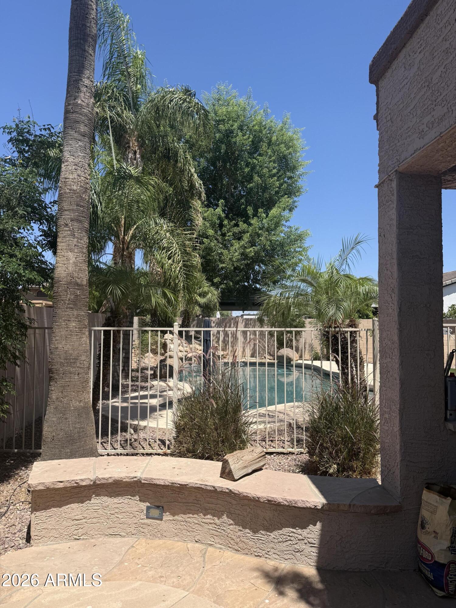 Beautiful home is a small gated community.  This gem is located in the most desirable area of Chandler,  close to the 202, shopping, great schools and entertainment.  The inside features a spacious floorpan with a large kitchen, family room, living room (game room) and a private oasis like backyard.