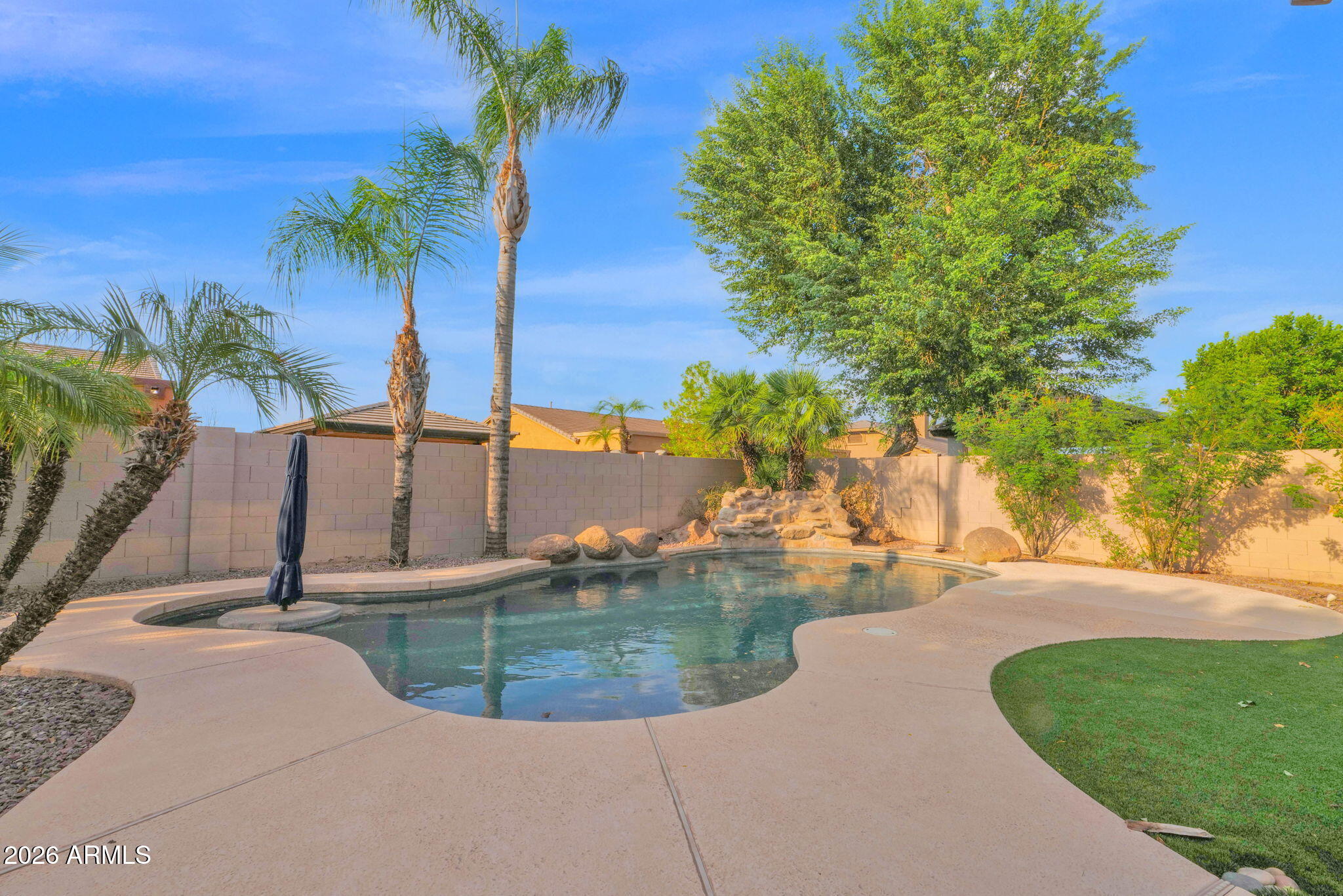 Beautiful home is a small gated community.  This gem is located in the most desirable area of Chandler,  close to the 202, shopping, great schools and entertainment.  The inside features a spacious floorpan with a large kitchen, family room, living room (game room) and a private oasis like backyard.
