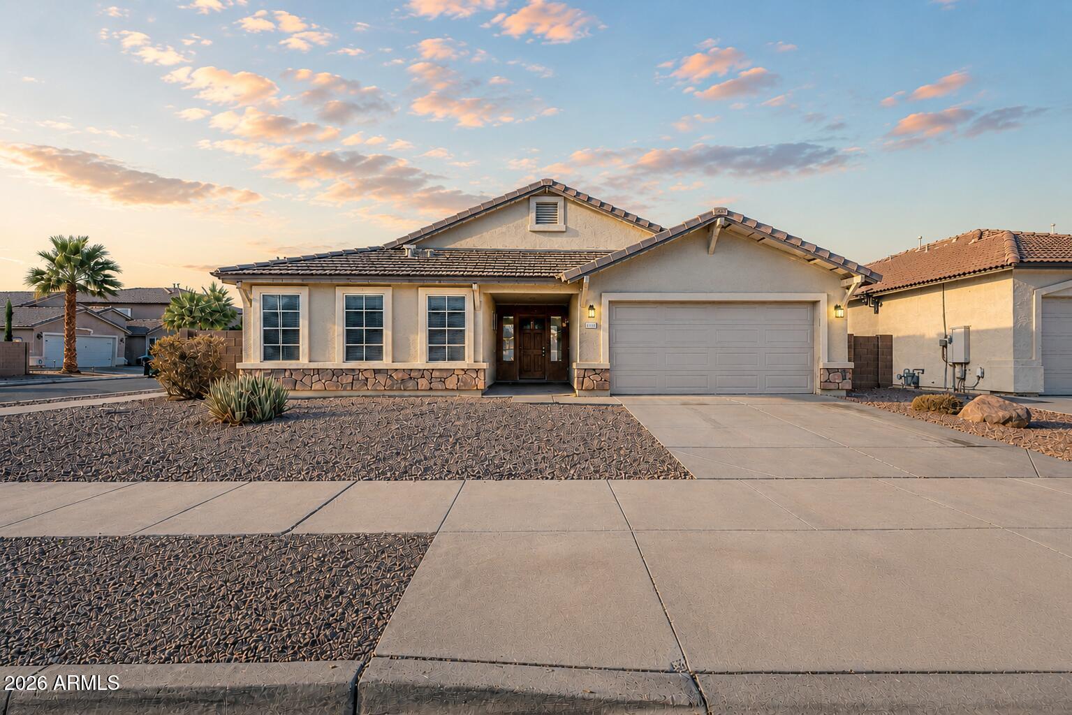Our preferred lender is offering a 1-0 buydown on this charming single-level home situated on a desirable corner lot. It features 4 bedrooms, 2 bathrooms, plus a versatile den--perfect for a home office or flex space. The split floor plan offers privacy and functionality, while vaulted ceilings create a bright, open feel. The spacious eat-in kitchen flows into the main living areas, ideal for entertaining. The primary suite includes an oversized walk-in closet and an ensuite bath with separate tub and shower, plus dual sinks. Additional highlights include north/south exposure. Enjoy a covered patio and low-maintenance custom desert landscaping.